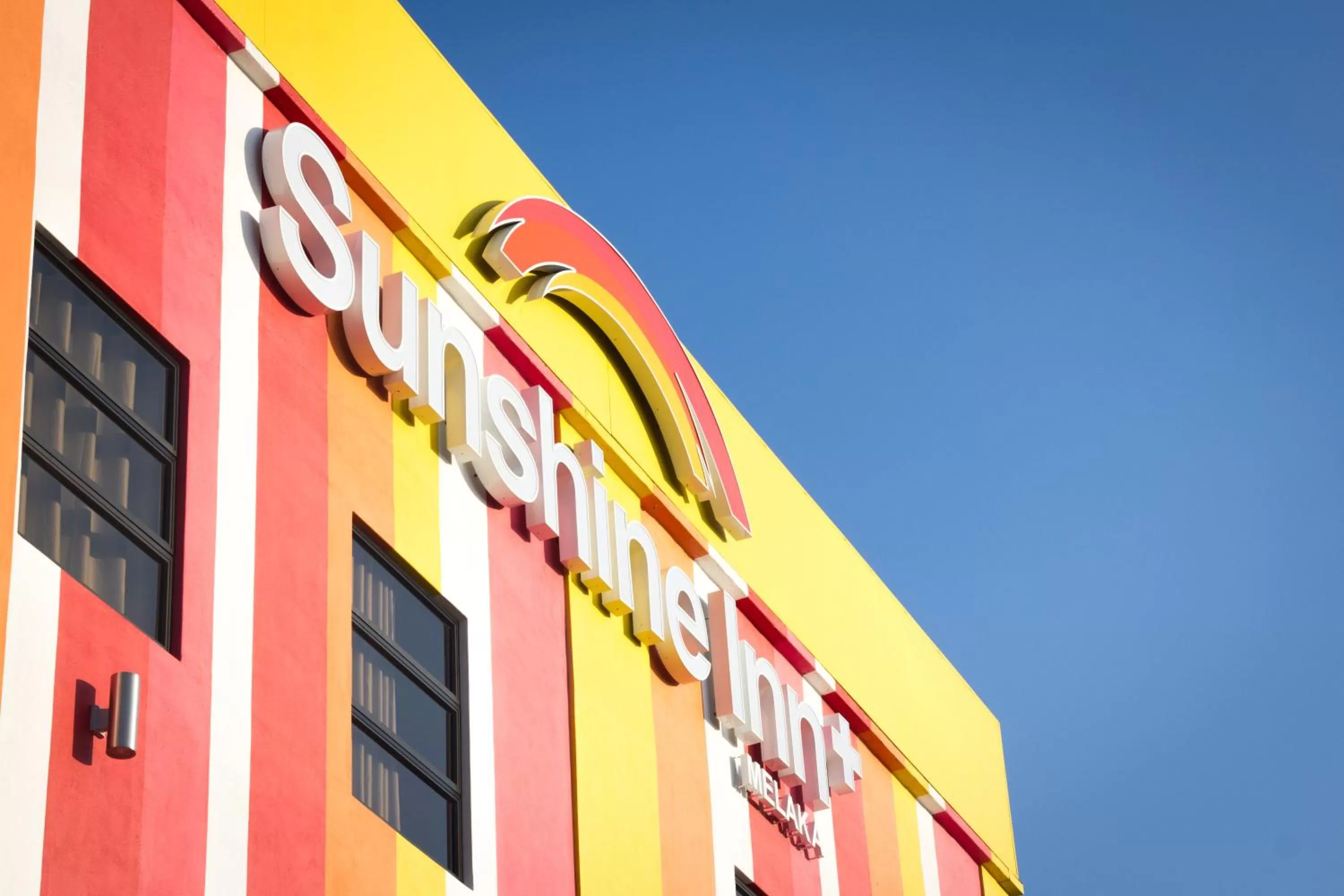 Property logo or sign in Sunshine Inn Plus