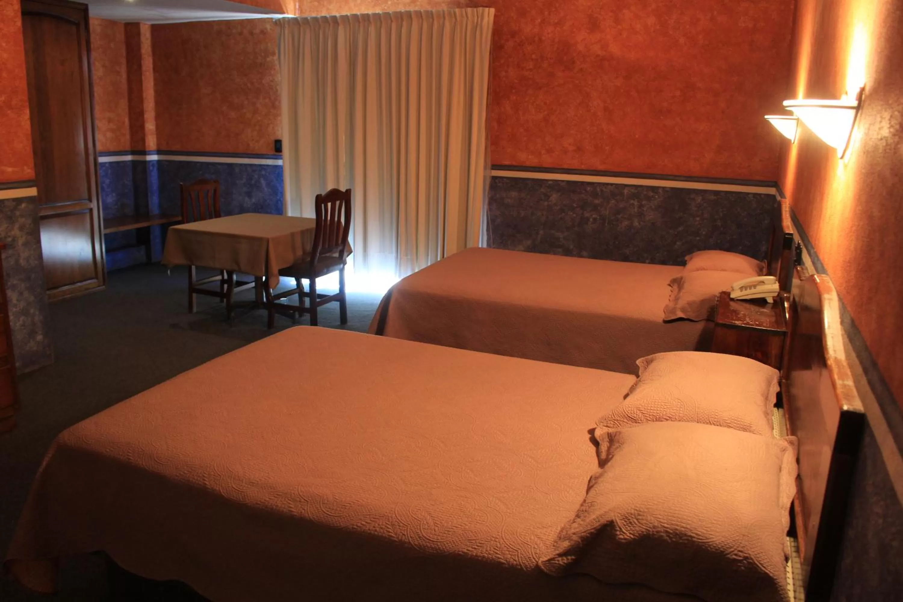 Bed in Hotel Meson del Puente