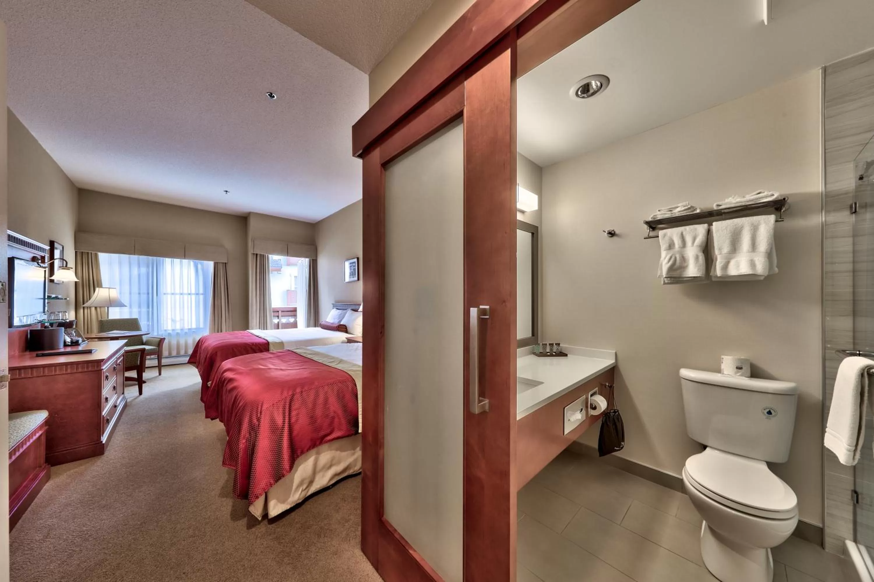 Photo of the whole room, Bed in Sun Peaks Lodge