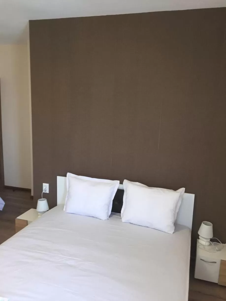 Bed in Family Hotel Malibu