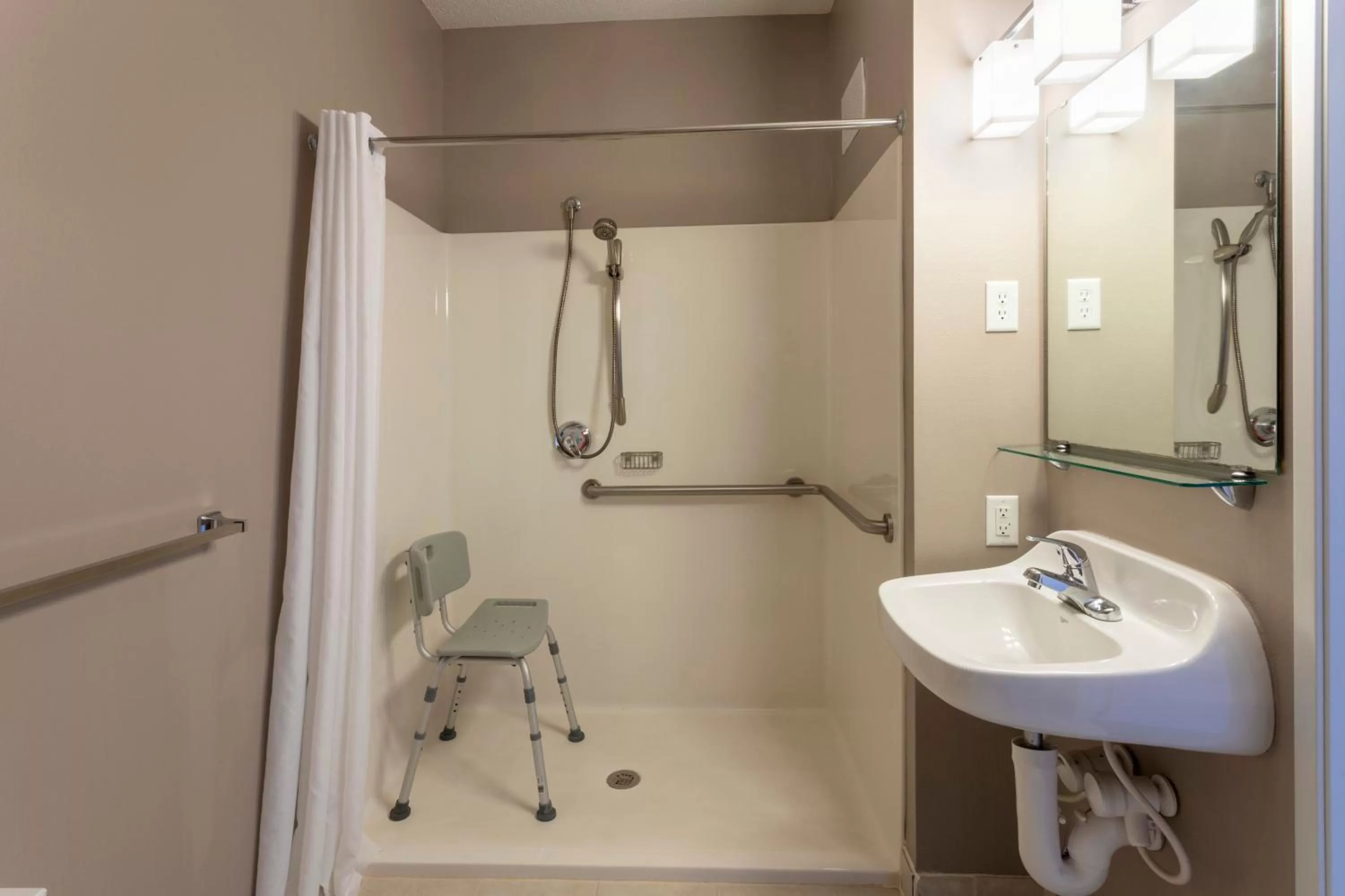 Bathroom in GrandStay Hotel & Suites Ames