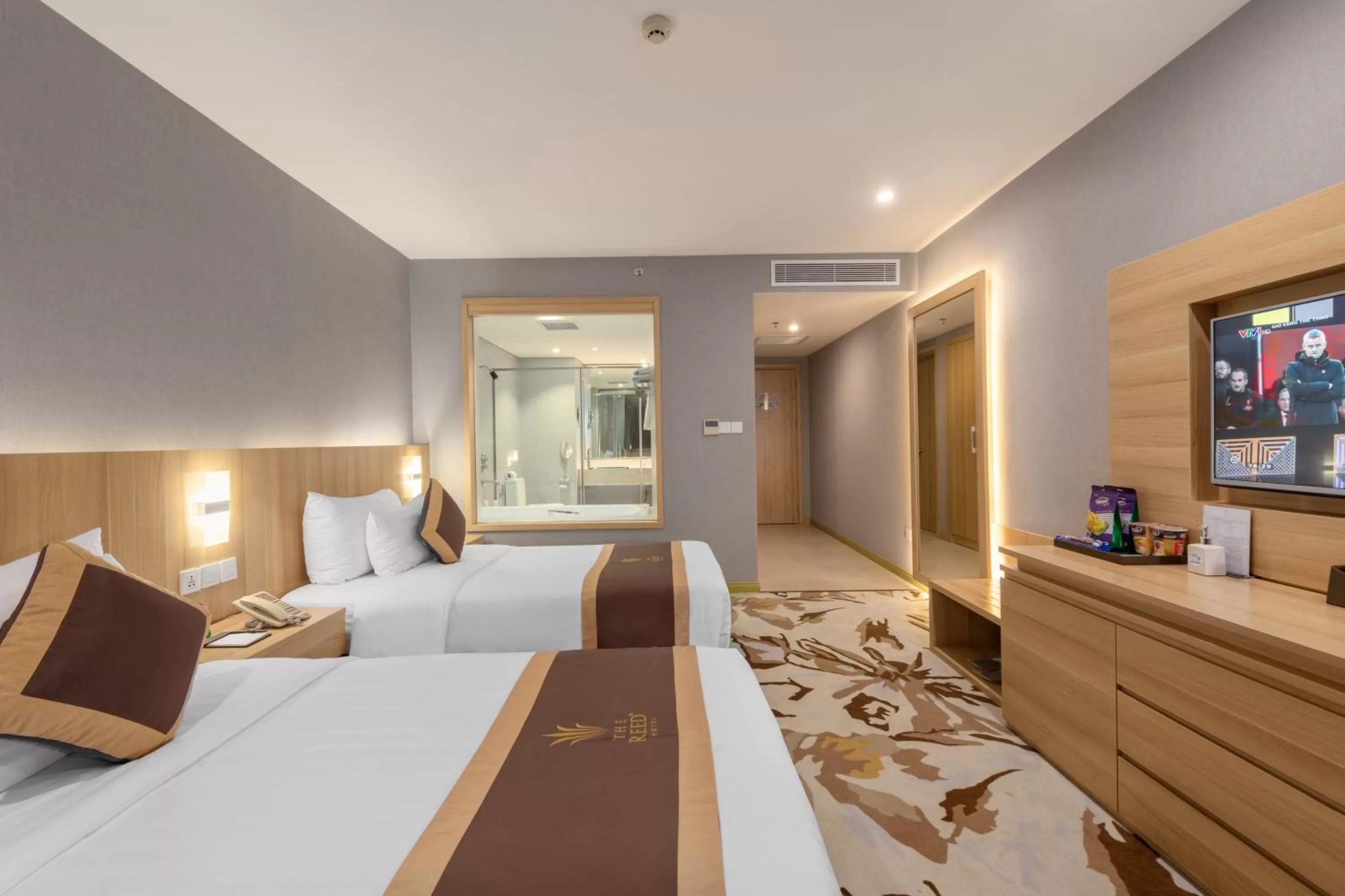 Bed in The Reed Hotel