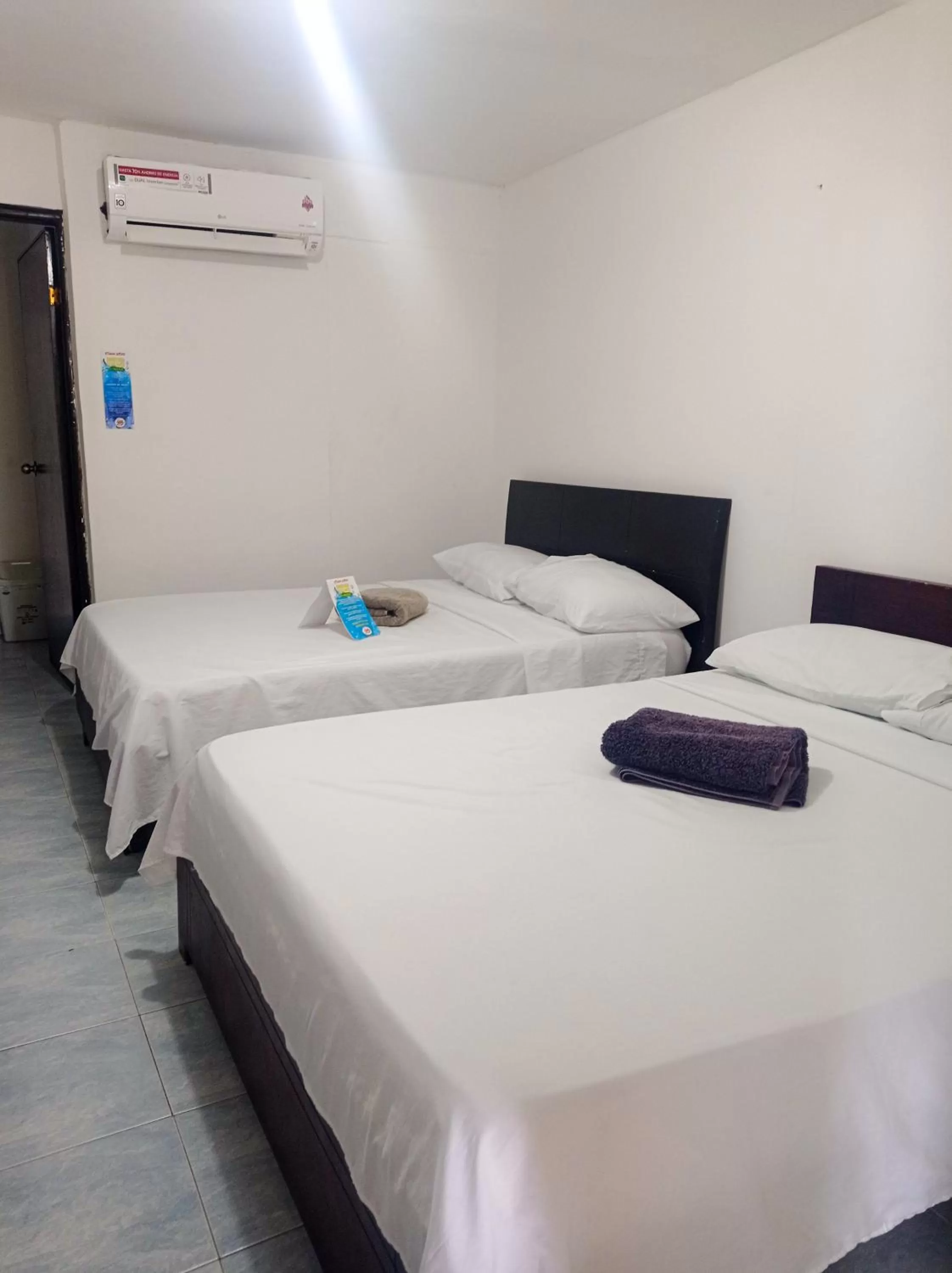 Bed in Posada Cultural Bahia Sonora