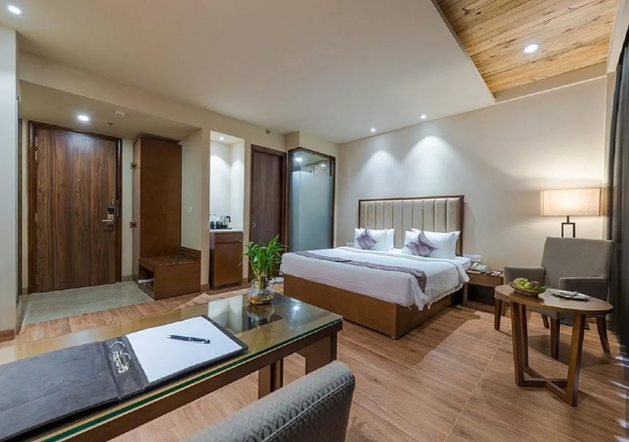 Photo of the whole room, Bed in Hotel Cachar Club