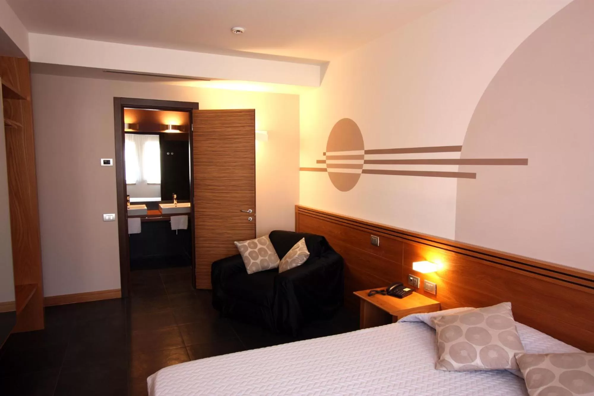 Photo of the whole room, Bed in Hotel Europa Belluno