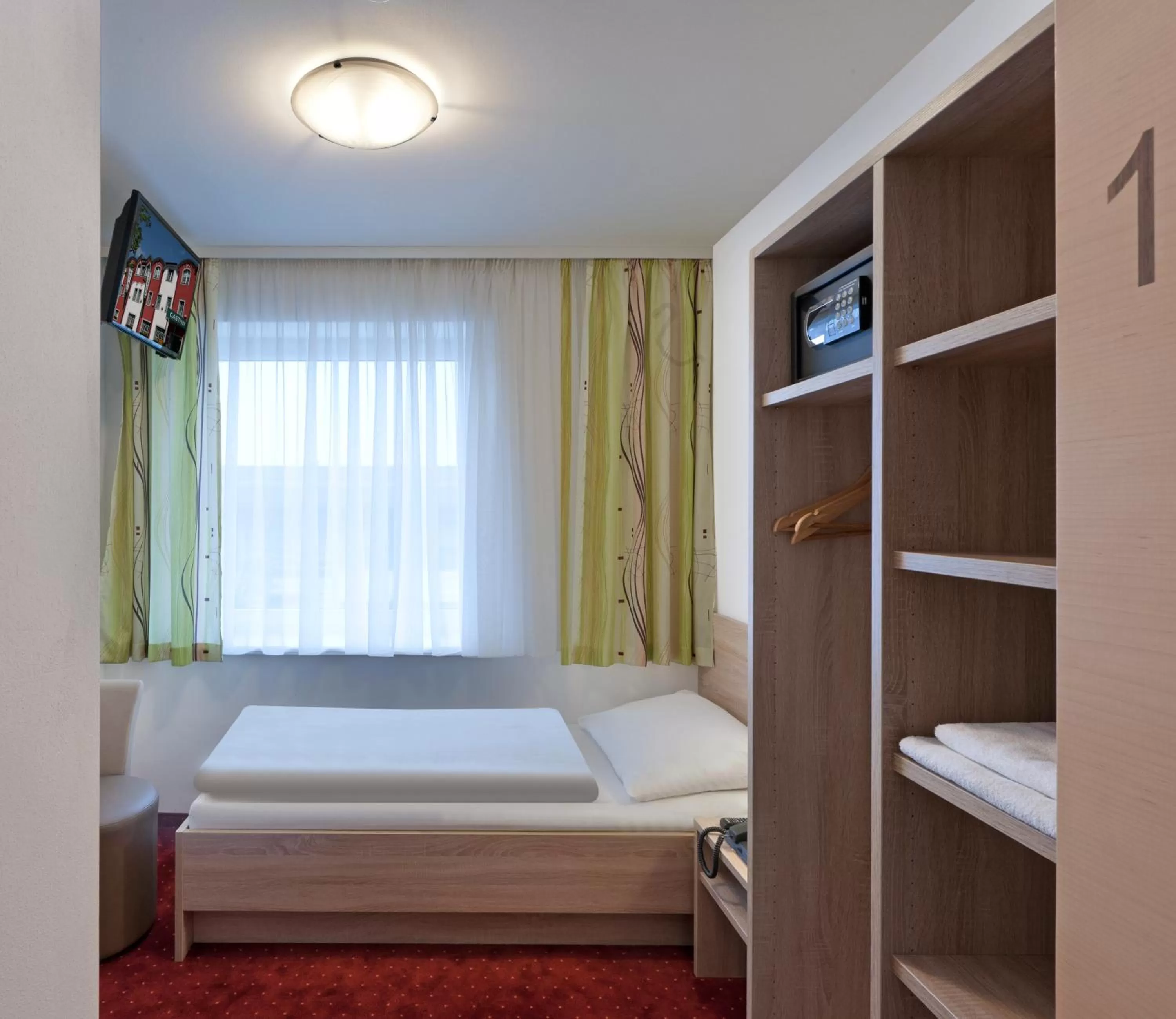 Photo of the whole room, Bed in Hotel Restaurant Wallner I contactless check-in