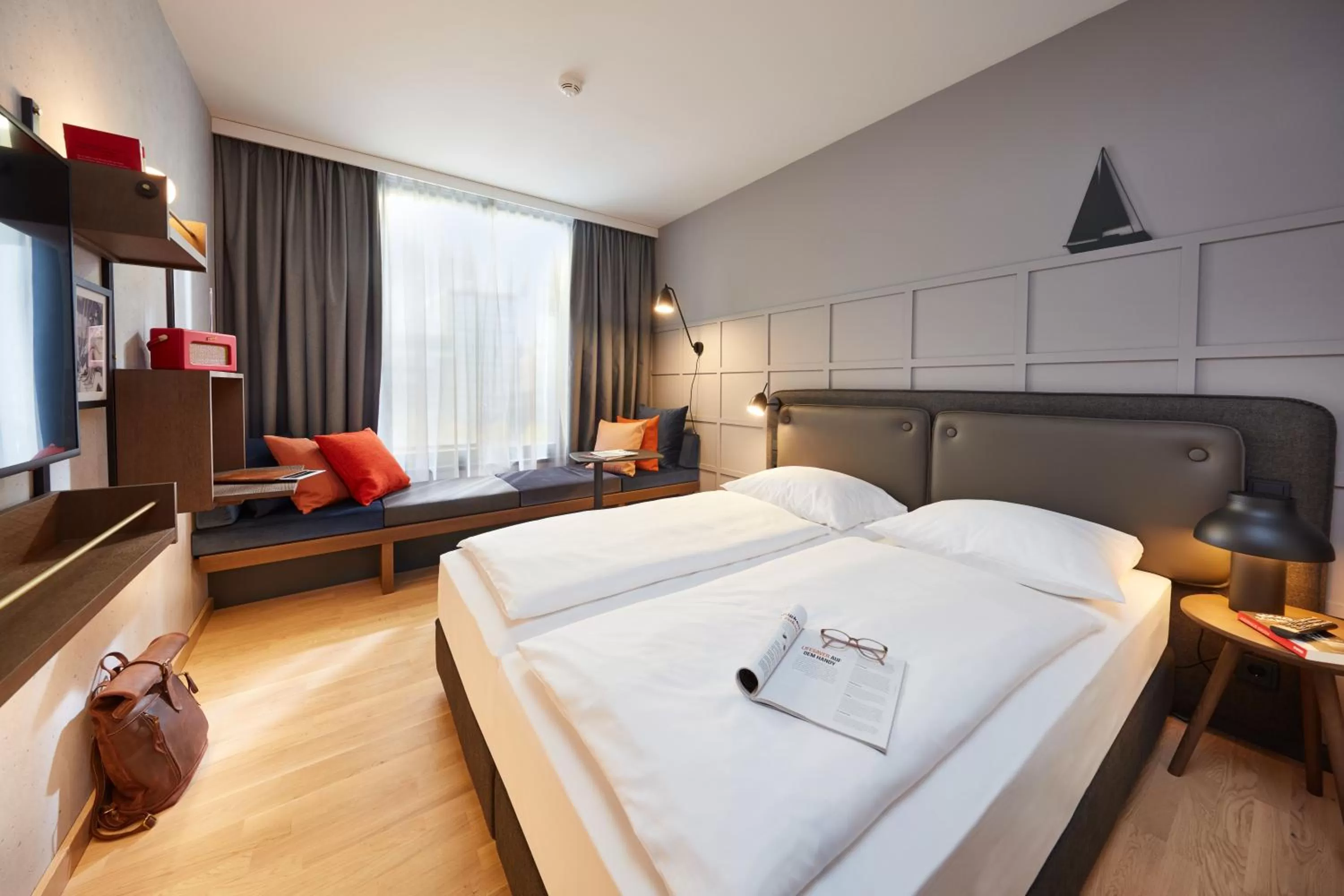Photo of the whole room, Bed in unique by ATLANTIC Hotels Kiel
