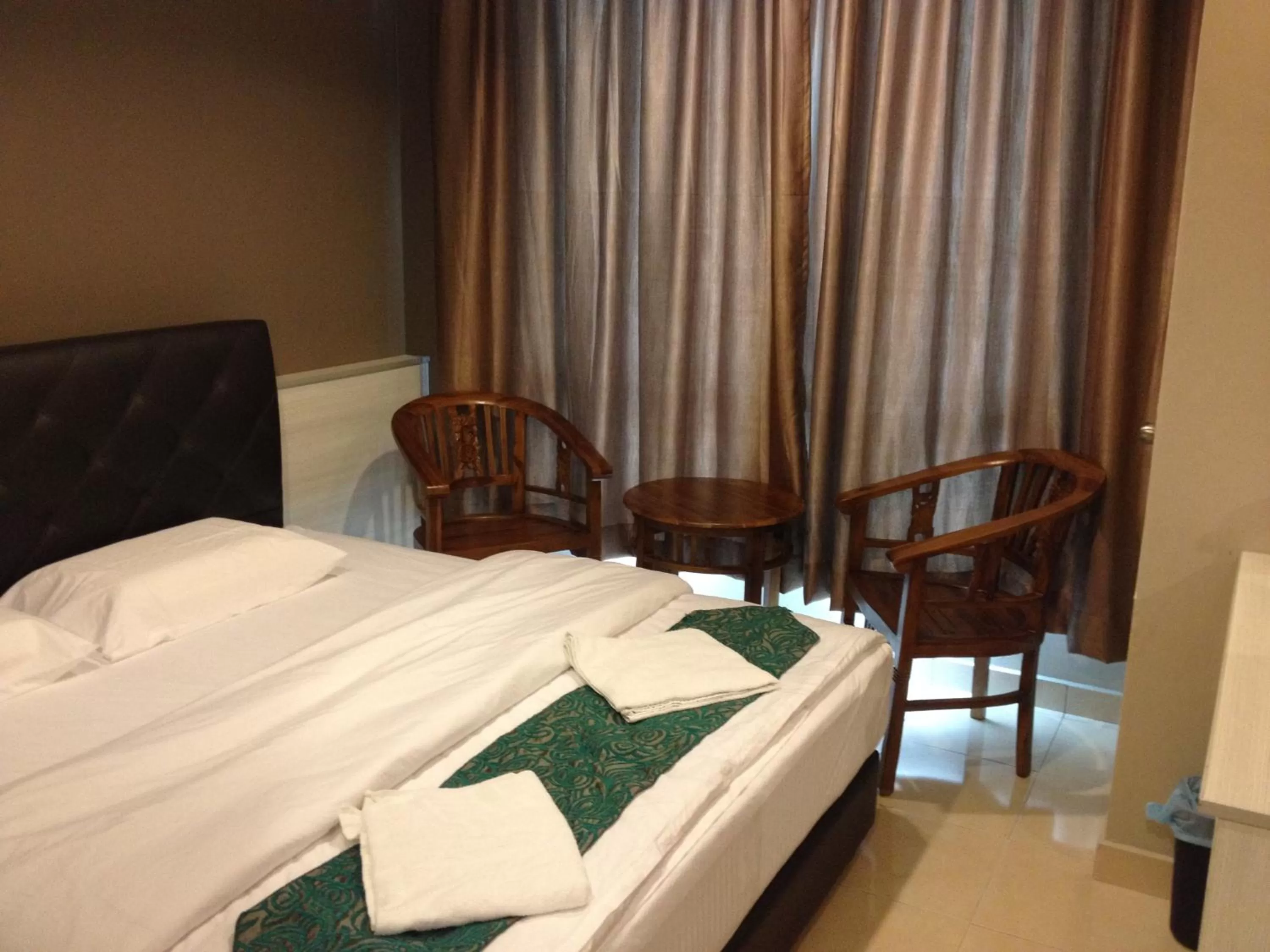 Bed in AERO Star Hotel