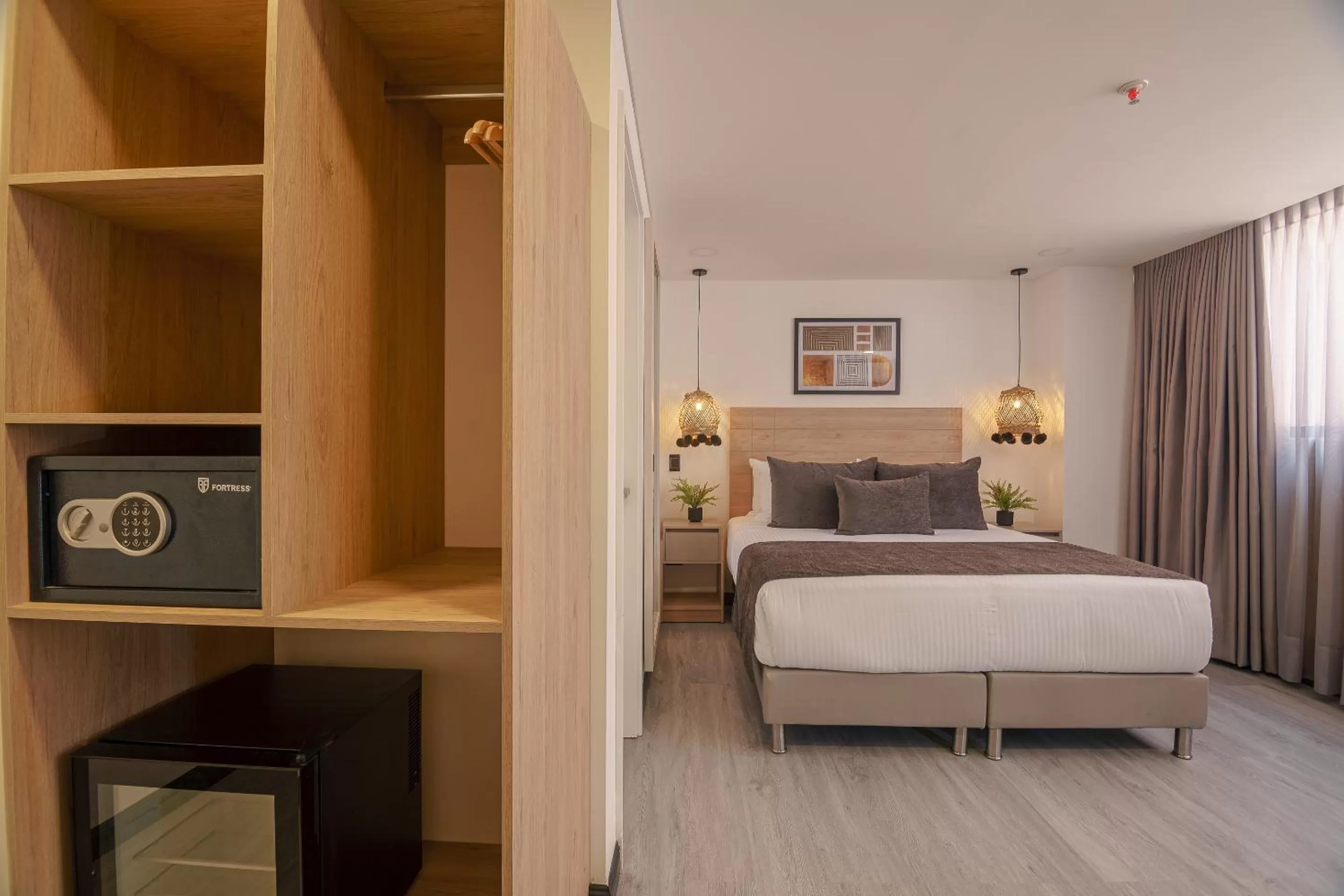 Photo of the whole room, Bed in First Class Hotel