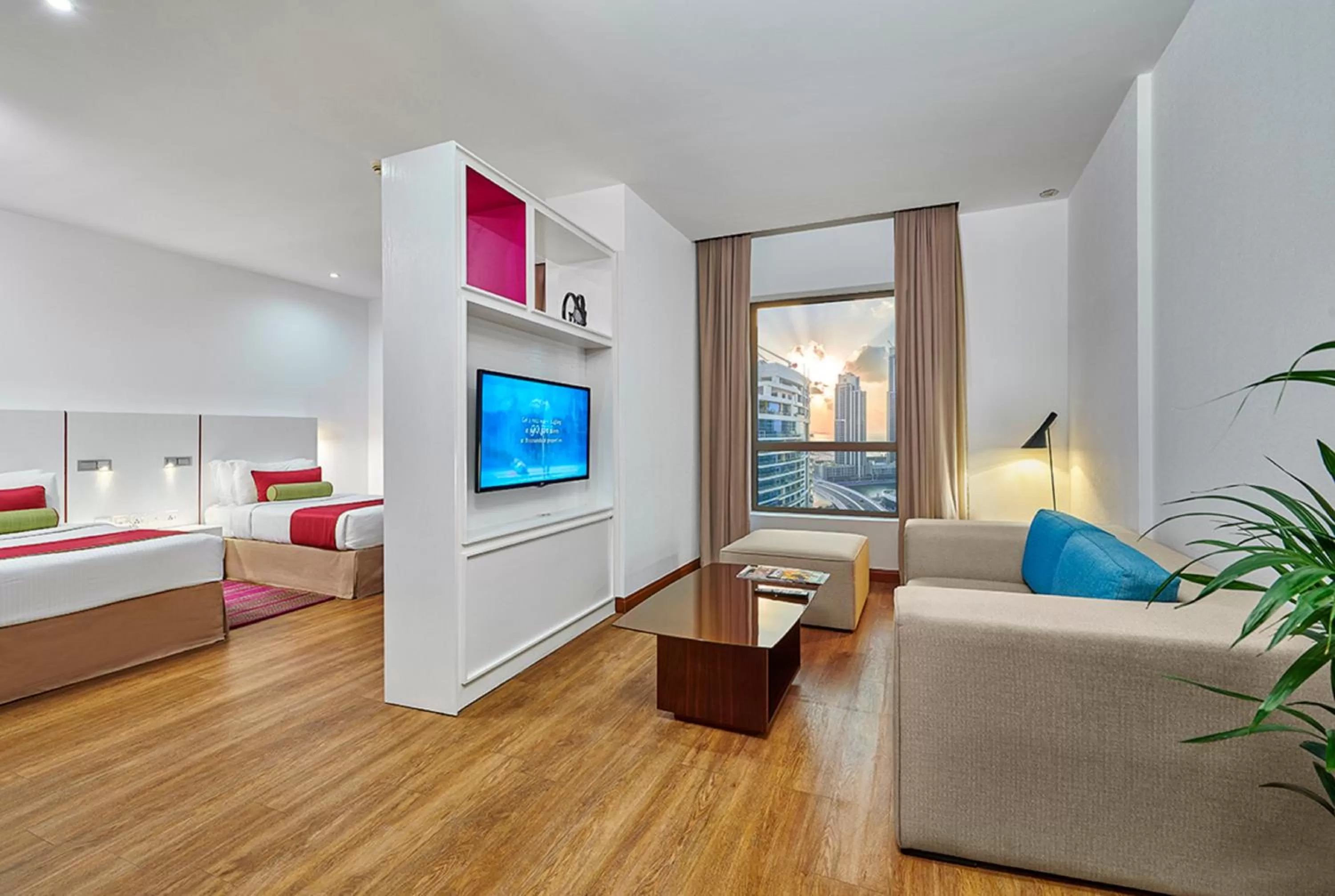 Living room, Bed in Ramada Hotel, Suites and Apartments by Wyndham Dubai JBR