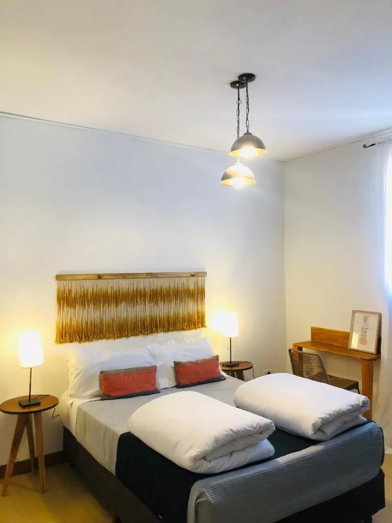 Photo of the whole room, Bed in My Pod House