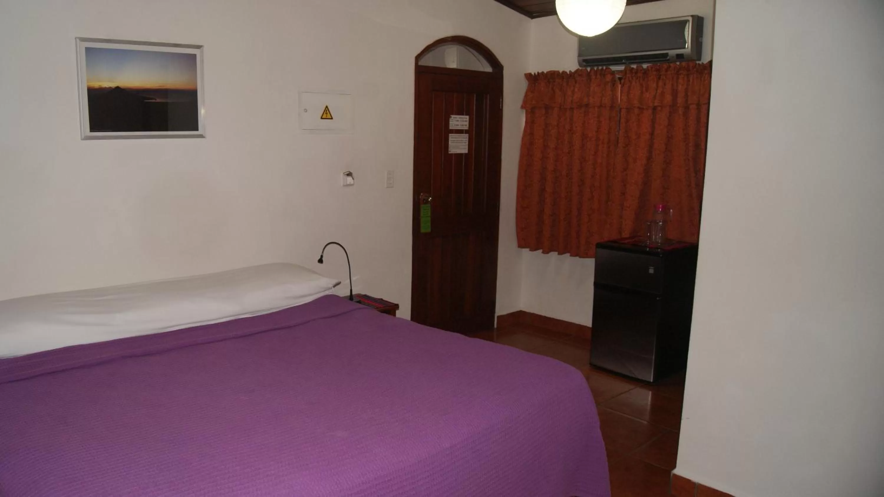 Photo of the whole room, Bed in Hotel Cacique Adiact