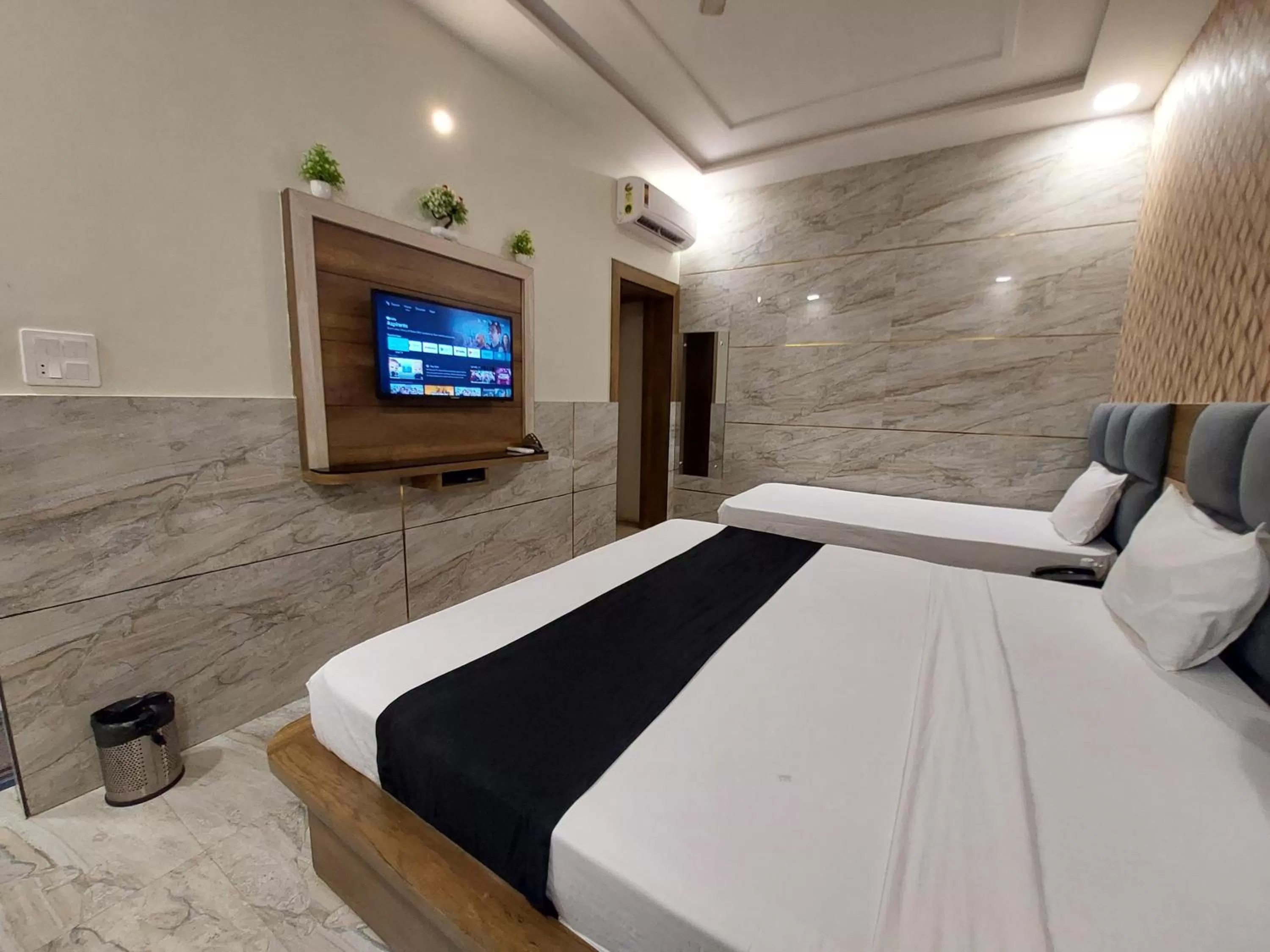 Photo of the whole room, Bed in Taj Nice Point Manage by Taj Sunrise Group