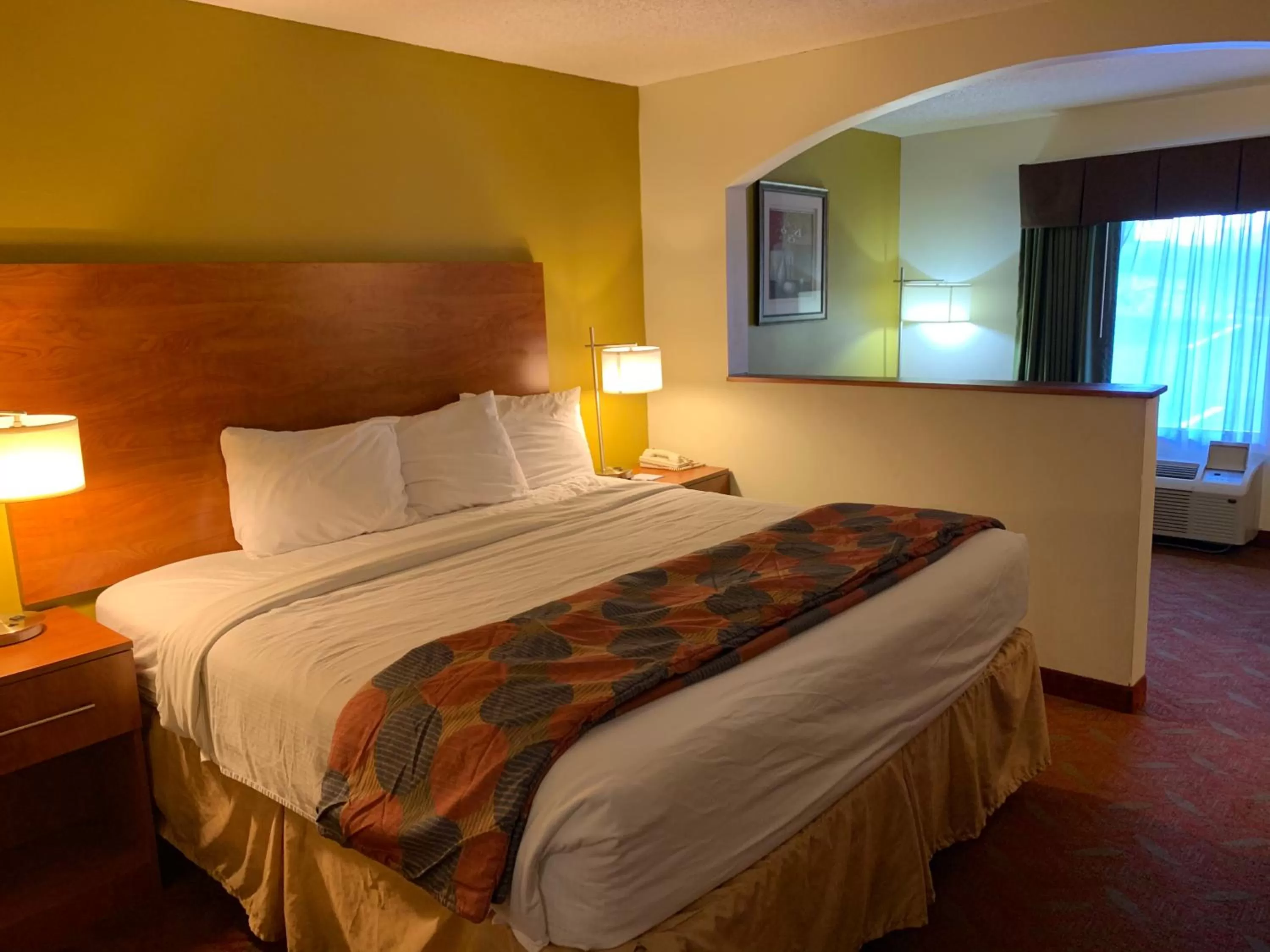 Bed in Baymont by Wyndham Cave City