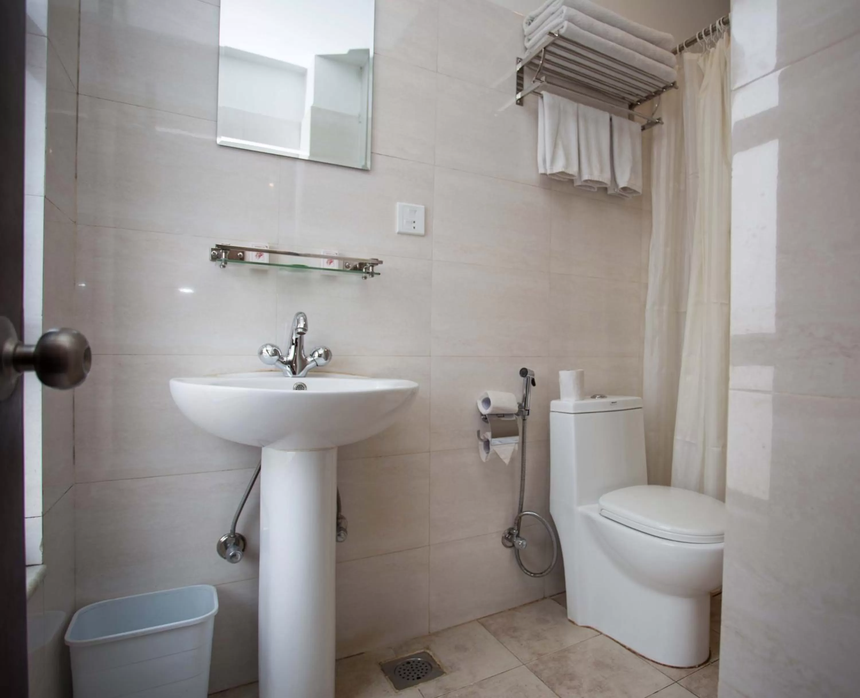 Bathroom in Hotel Jay Suites