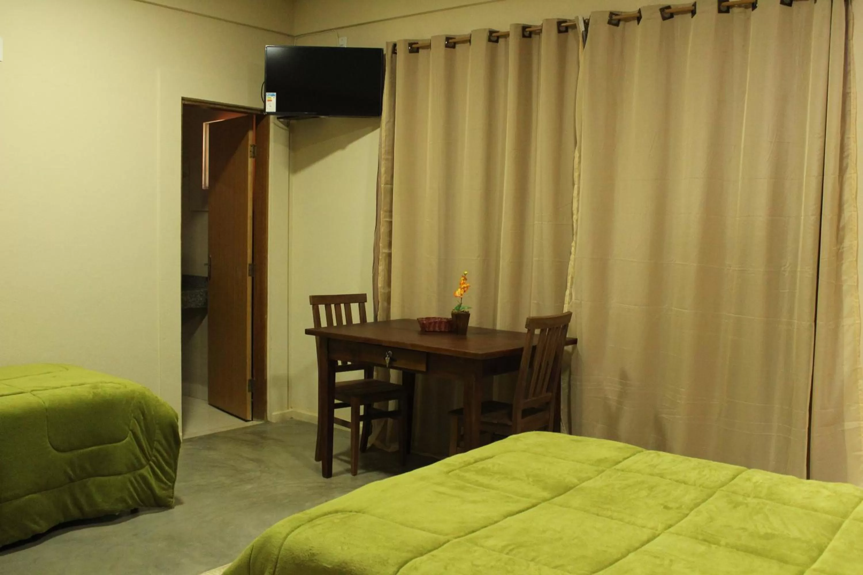 Bed in Pousada Morro dos Ventos