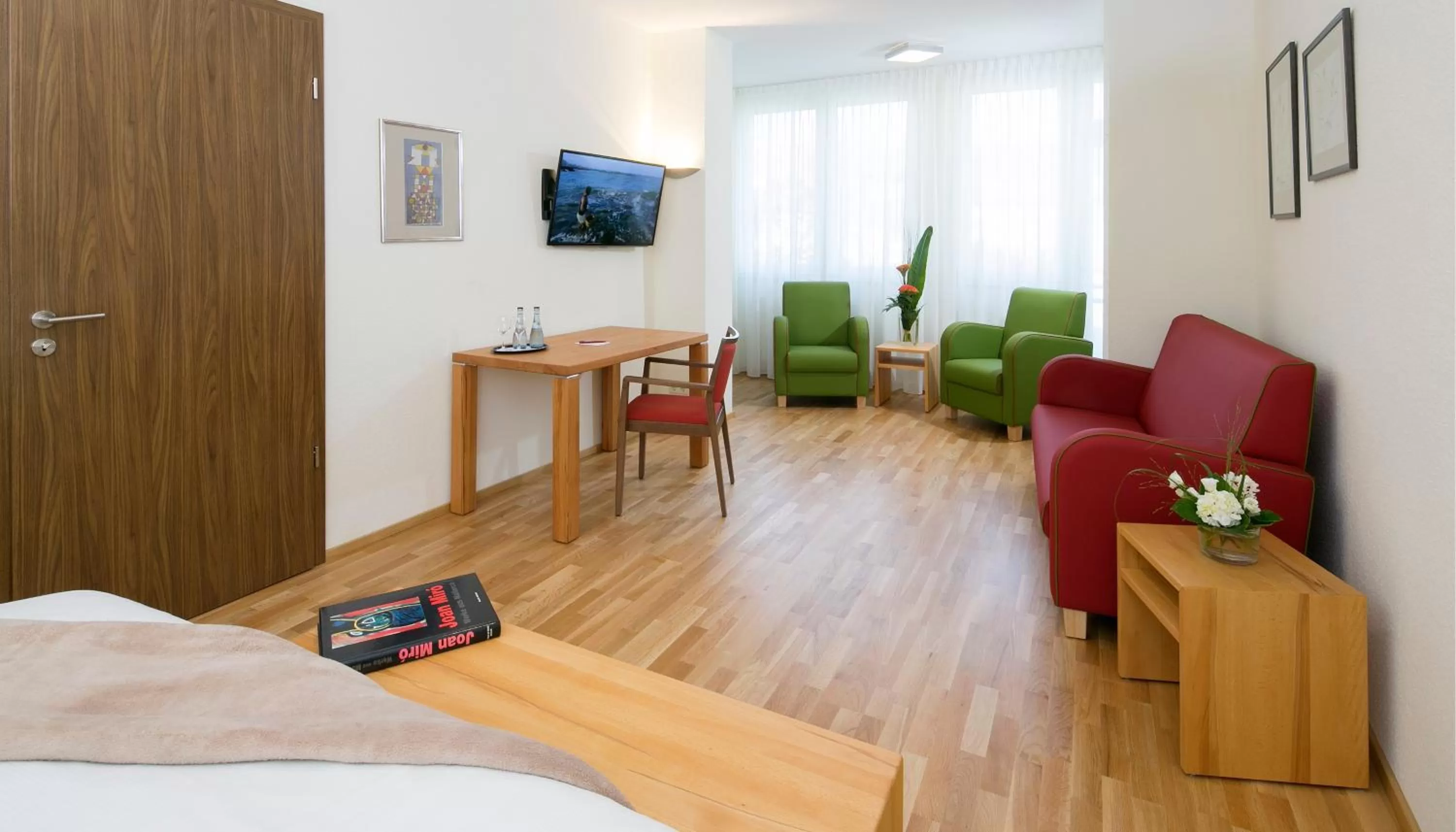 Seating area, Bed in Hotel Löwengarten