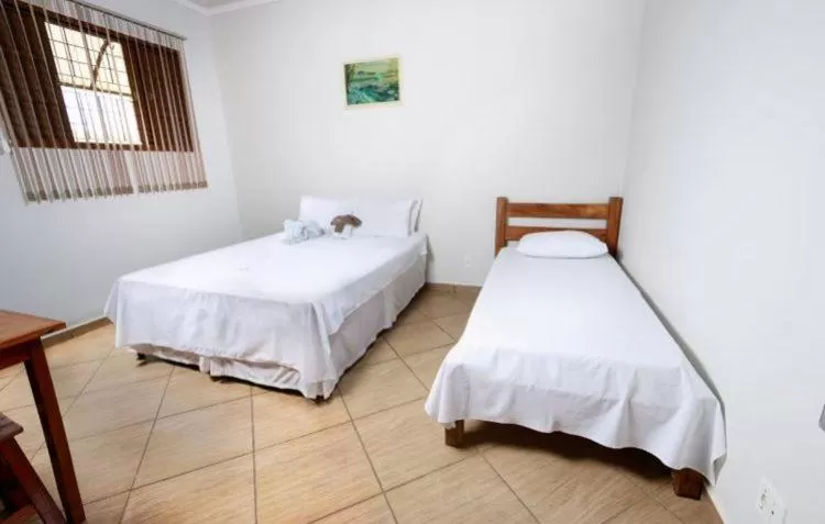 Bedroom, Bed in Hotel Portela III - Aprox 600m do Thermas dos Laranjais e Hot Beach