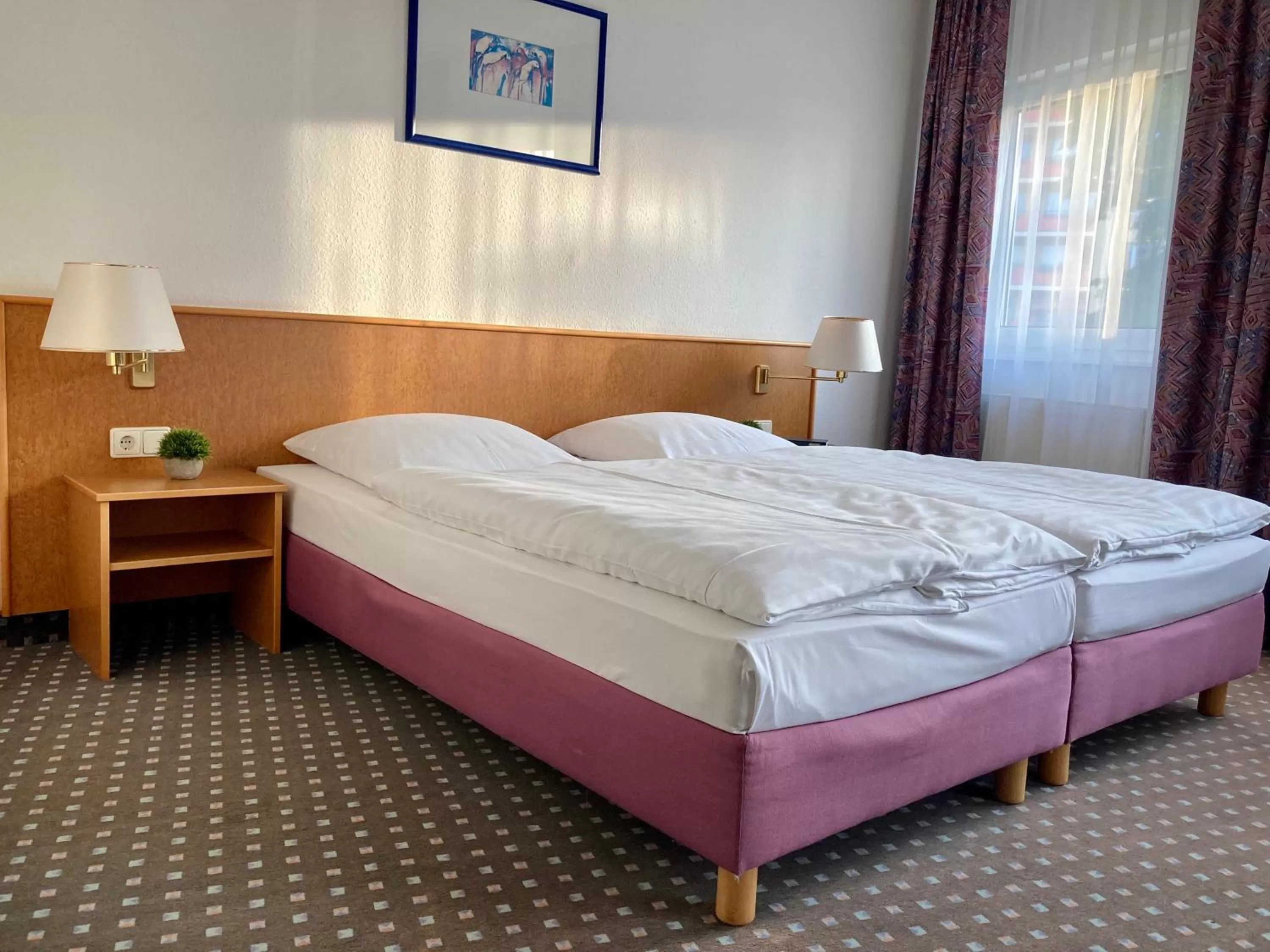 Bed in Akzent Congresshotel Hoyerswerda