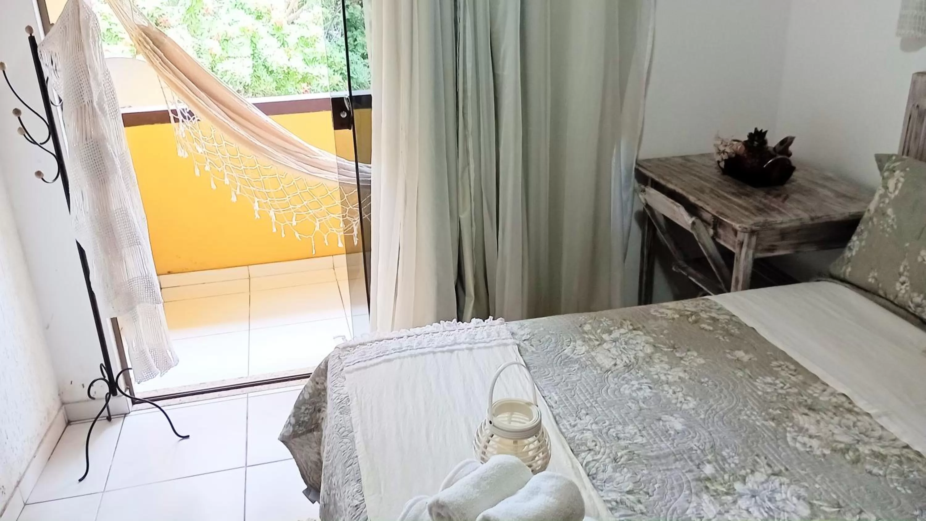 Bed in Hibiscos Pousada