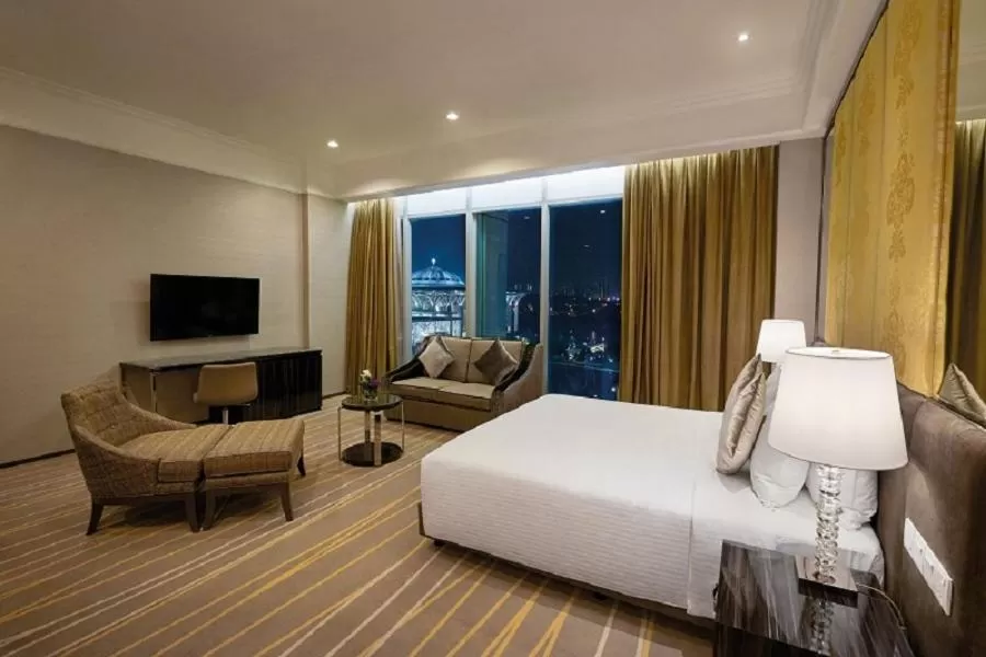 Communal lounge/ TV room, Bed in Dorsett Putrajaya