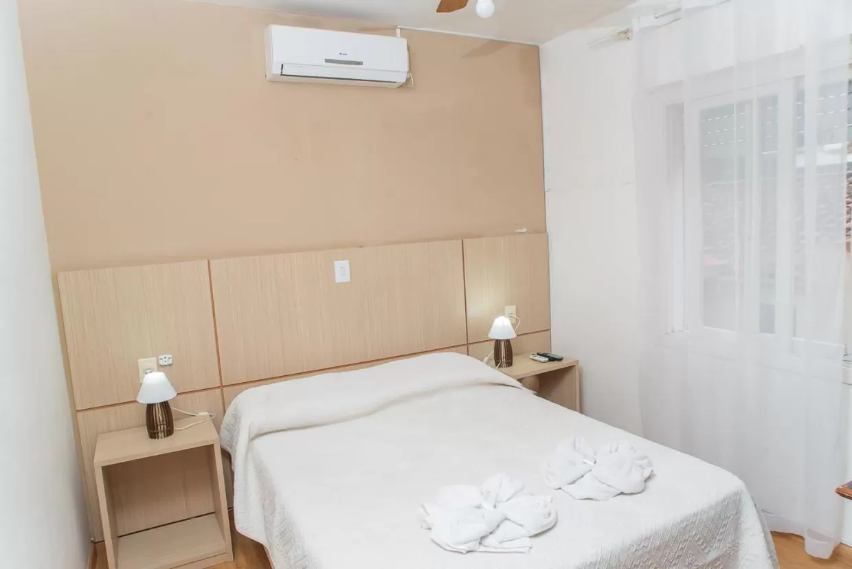 Bed in hotel py jaguarão