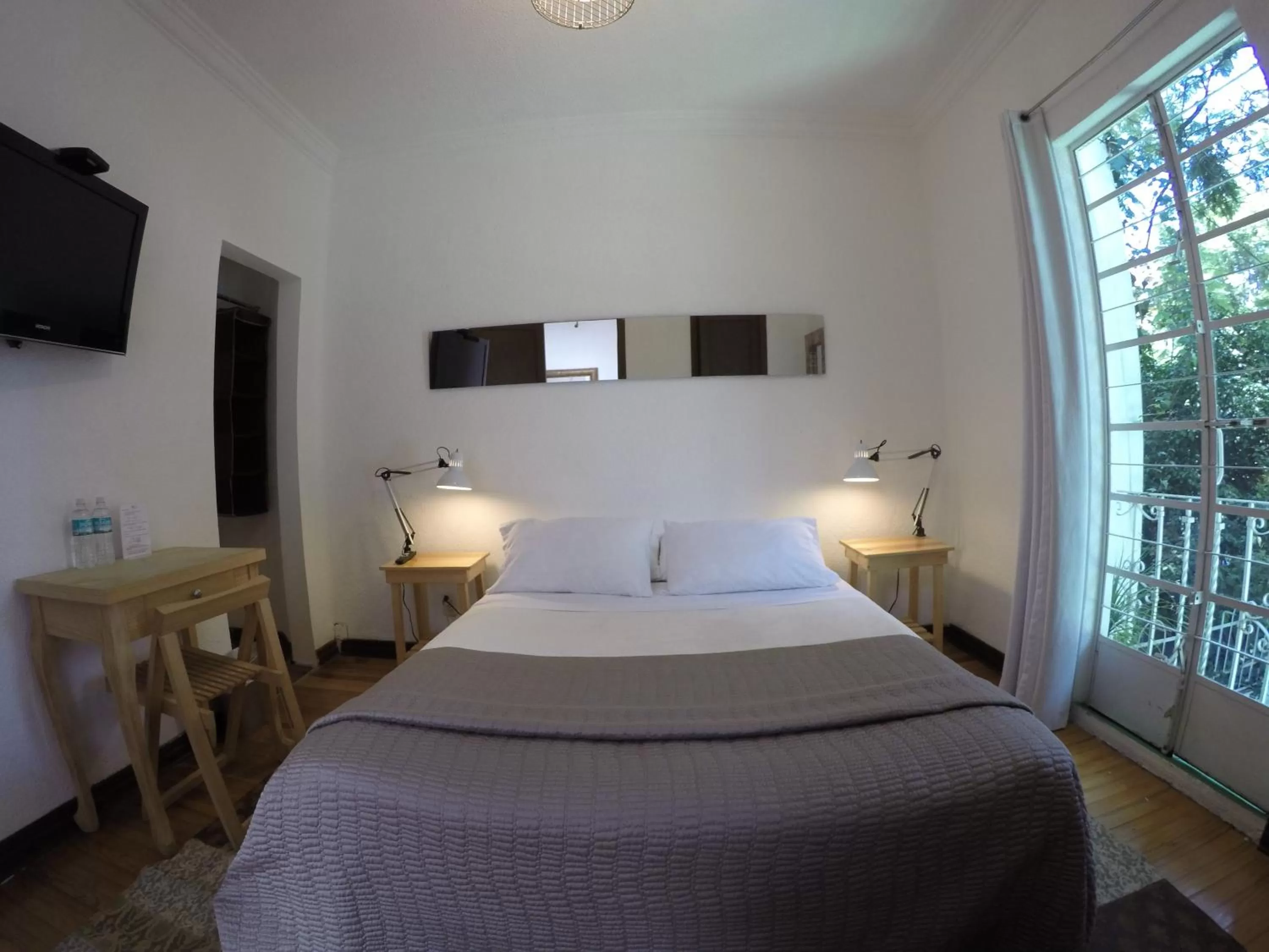 Photo of the whole room, Bed in Distrito Condesa Rooms and Studios