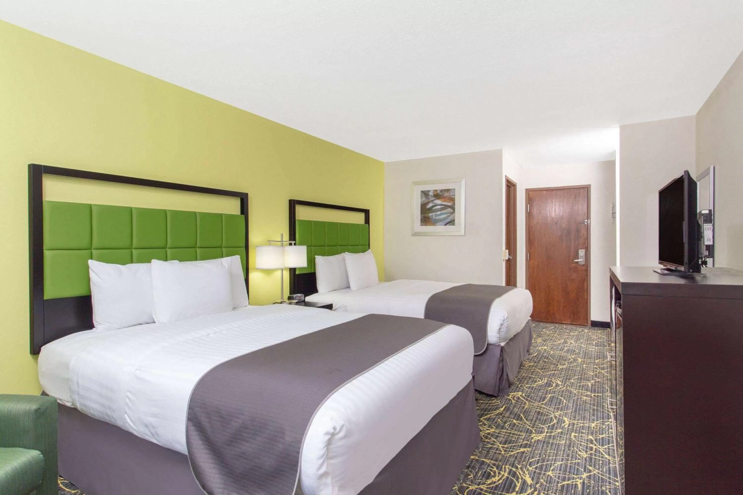 Queen Room with Two Queen Beds - Non-Smoking in AmericInn and Suites by Wyndham Delafield-Waukesha-Milwaukee