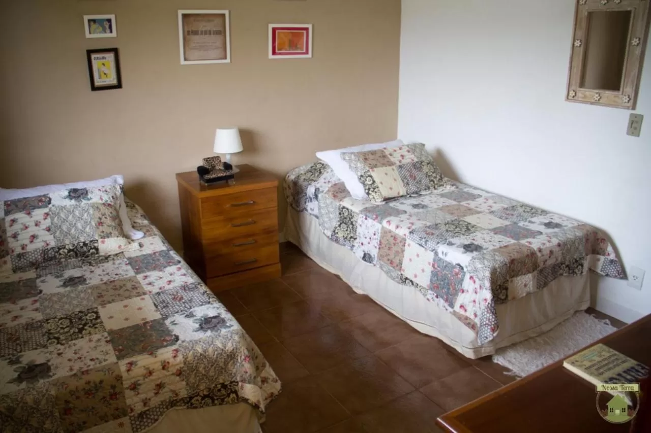 Bed in Pousada Nossa Terra
