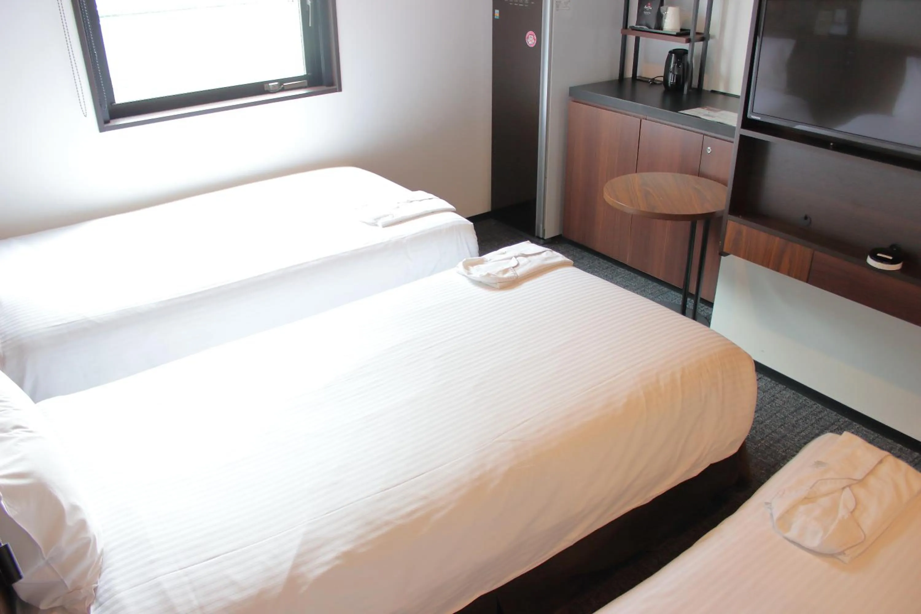 Bed in Henn na Hotel Tokyo Akasaka