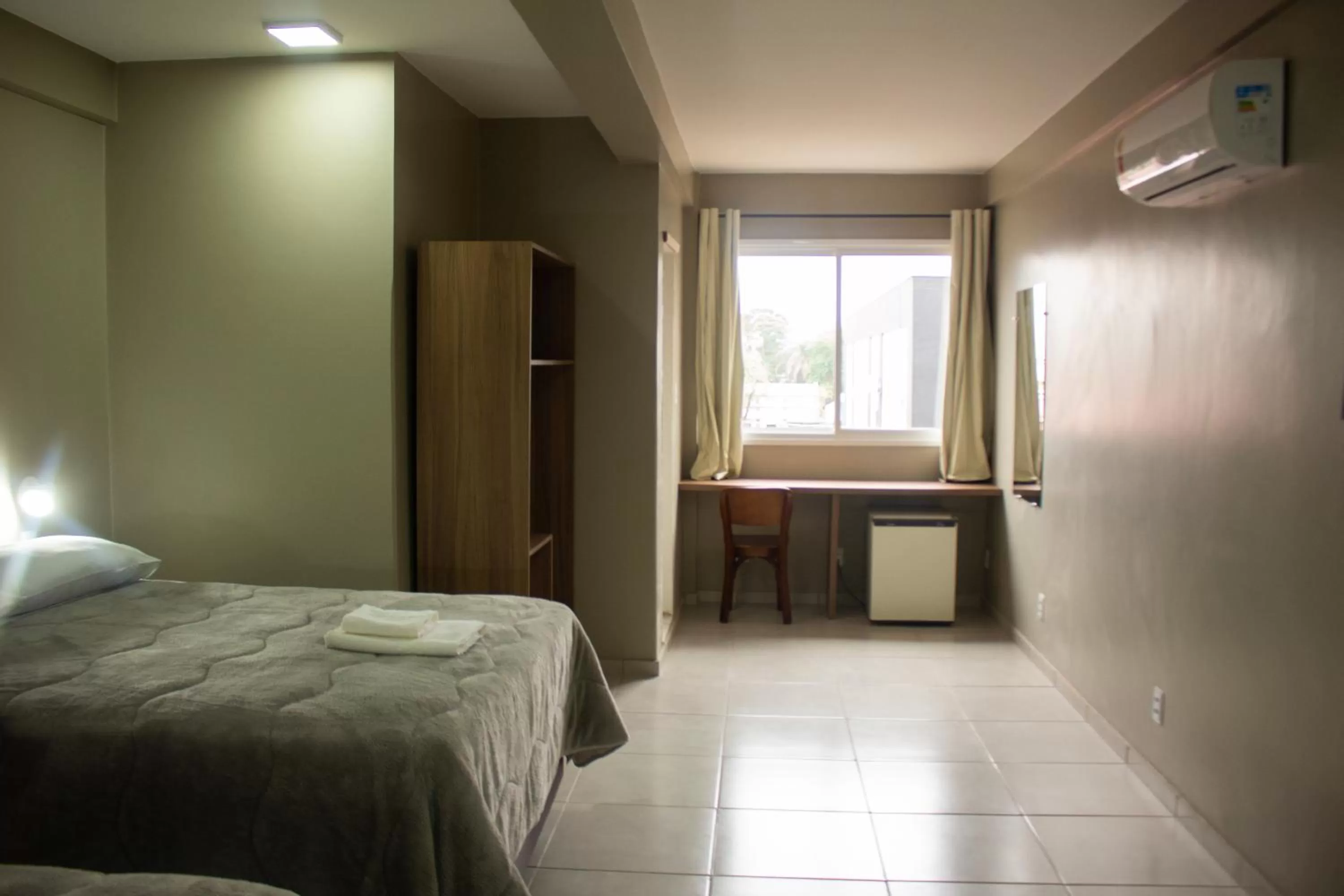 Bed in Hotel Executivo