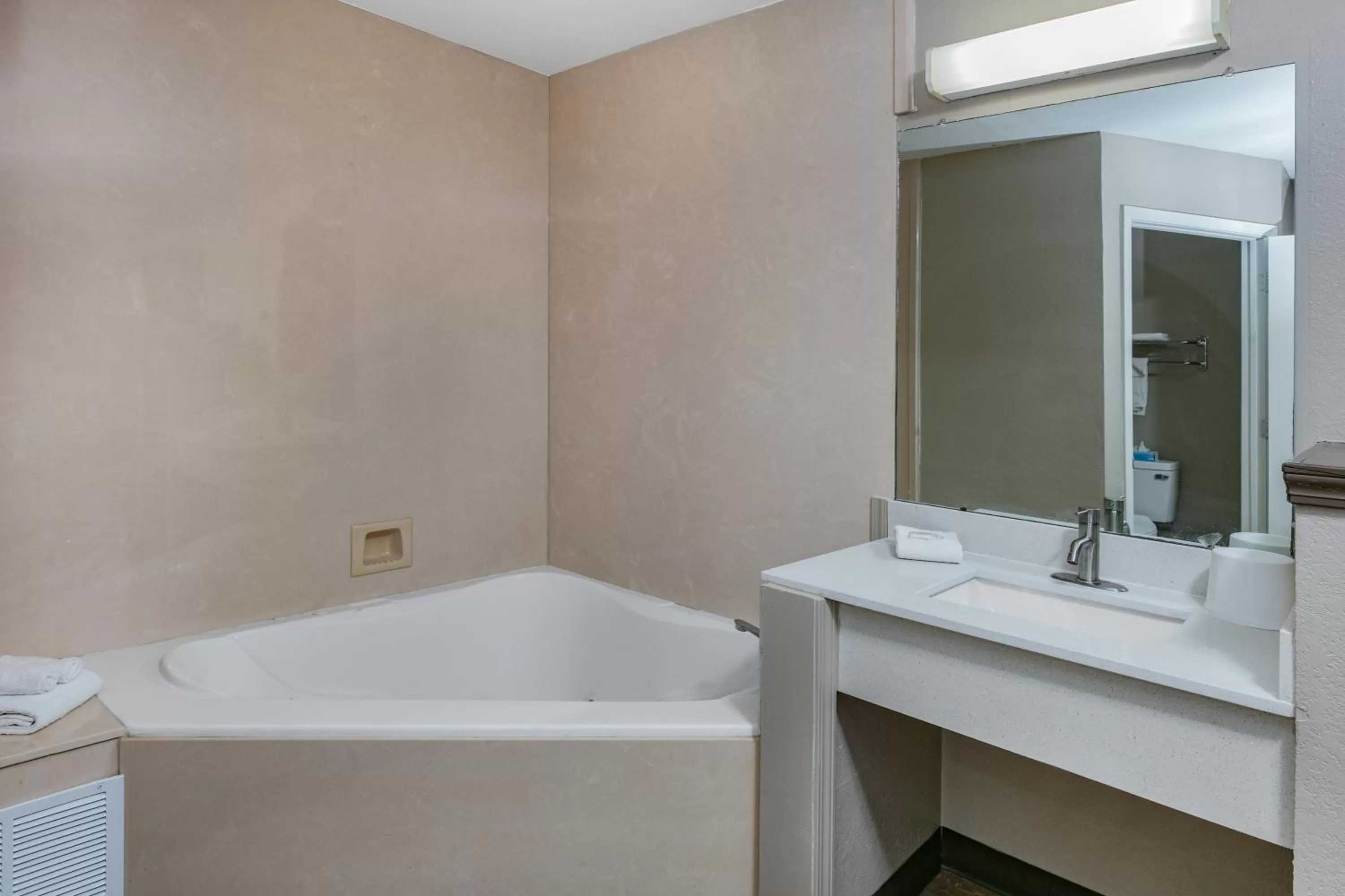 Bathroom in Super 8 by Wyndham Moss Point