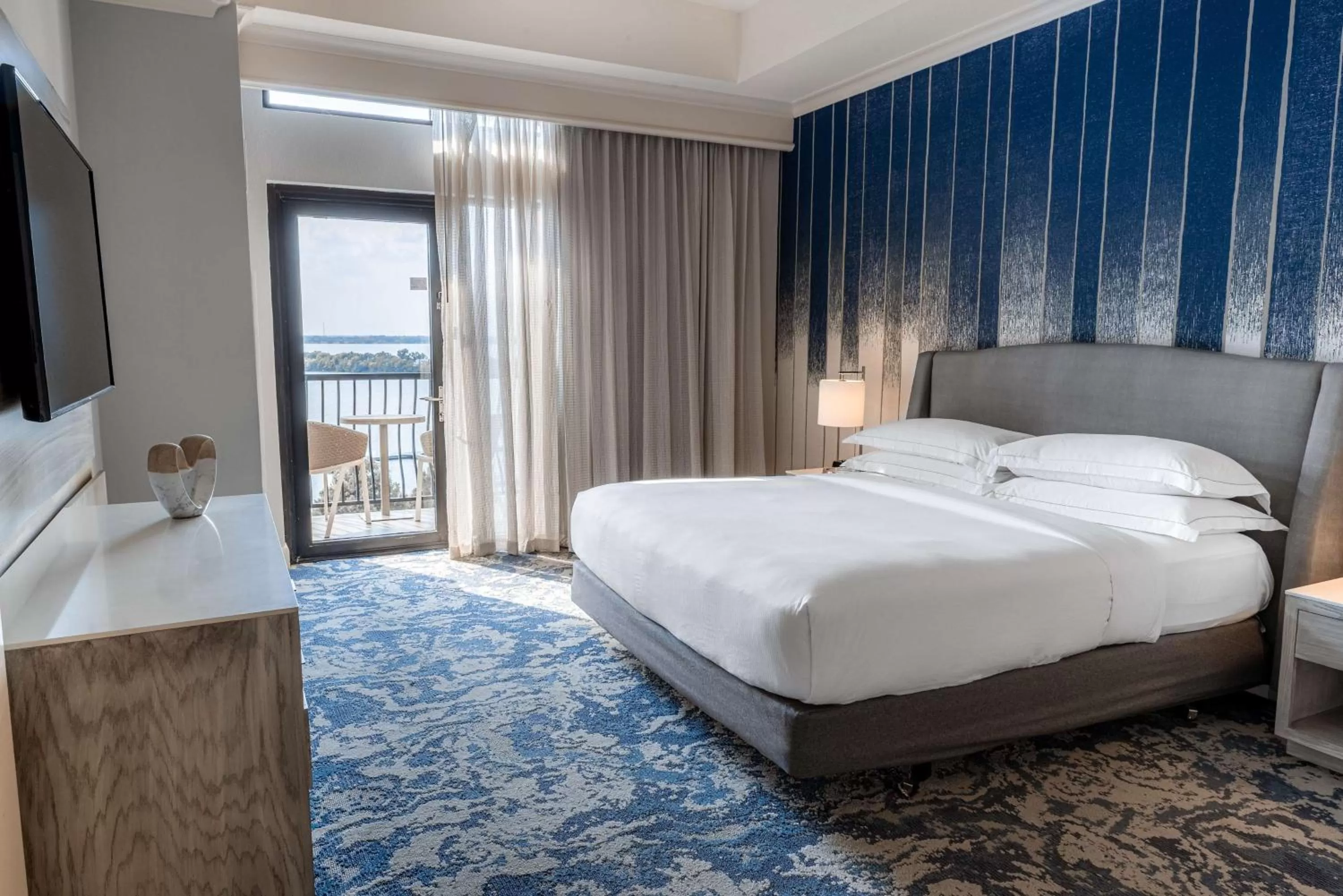 Bed in Hilton Dallas/Rockwall Lakefront Hotel