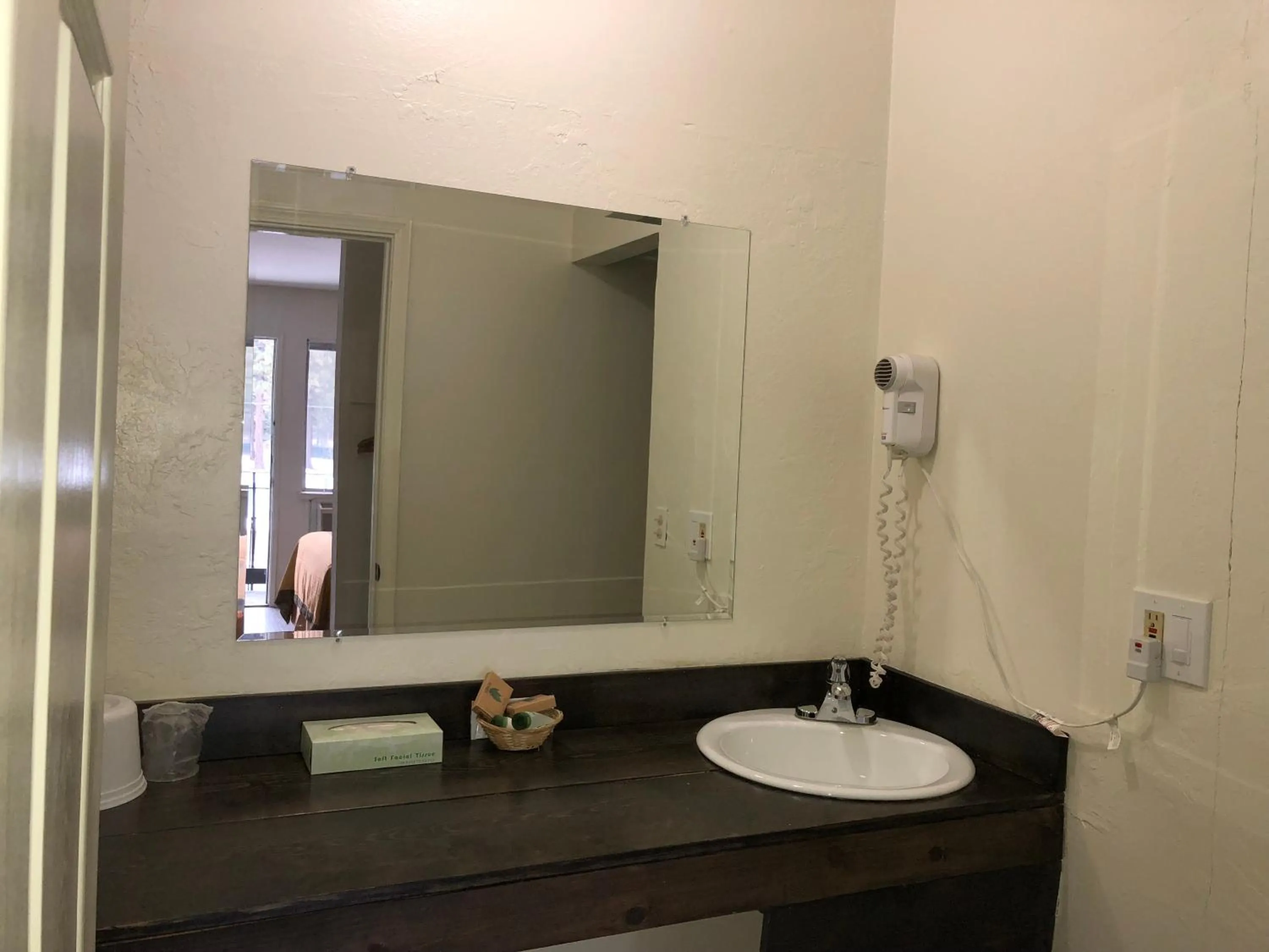 Bathroom in Cedar Inn & Suites