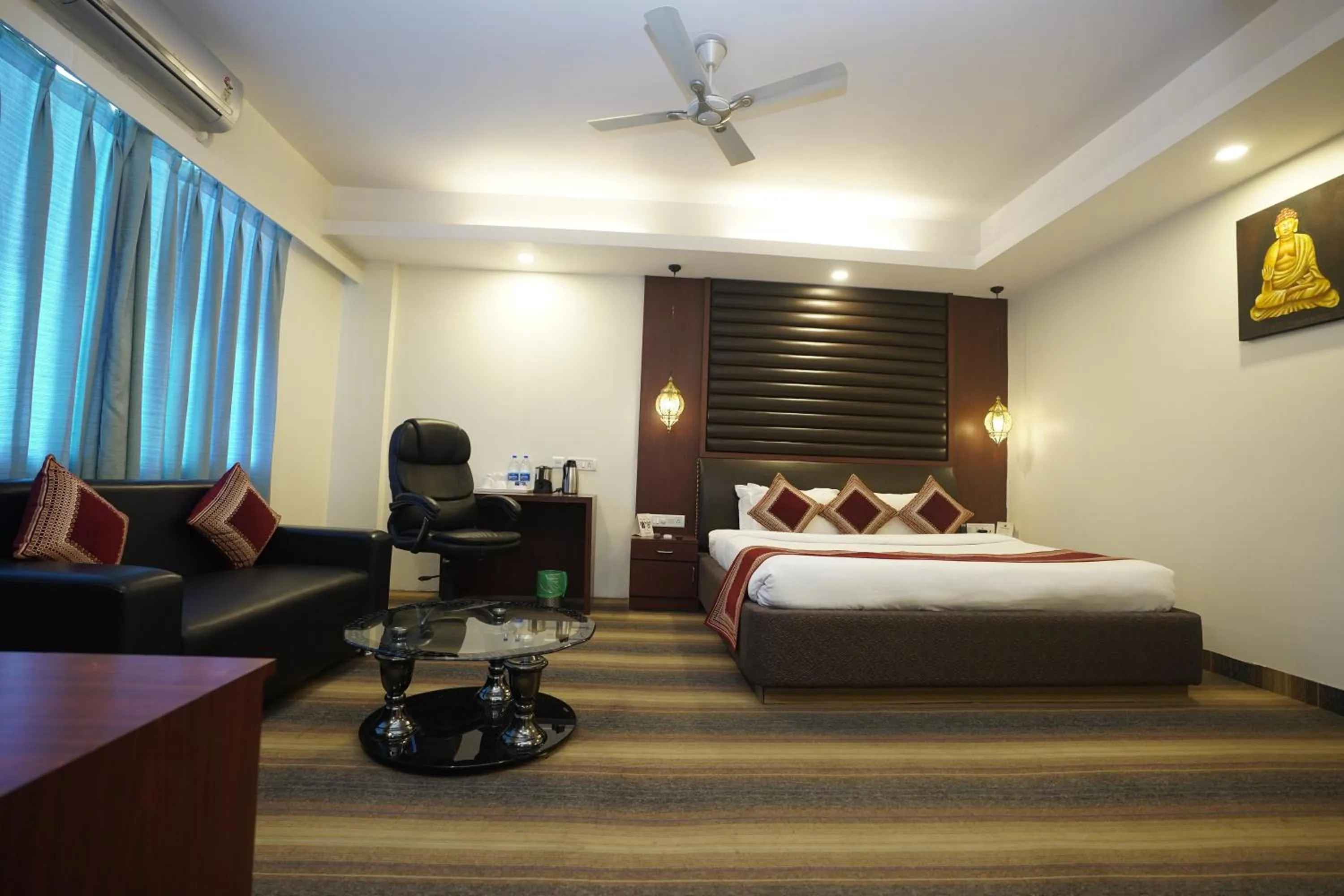 Photo of the whole room, Bed in HOTEL AVN GRAND