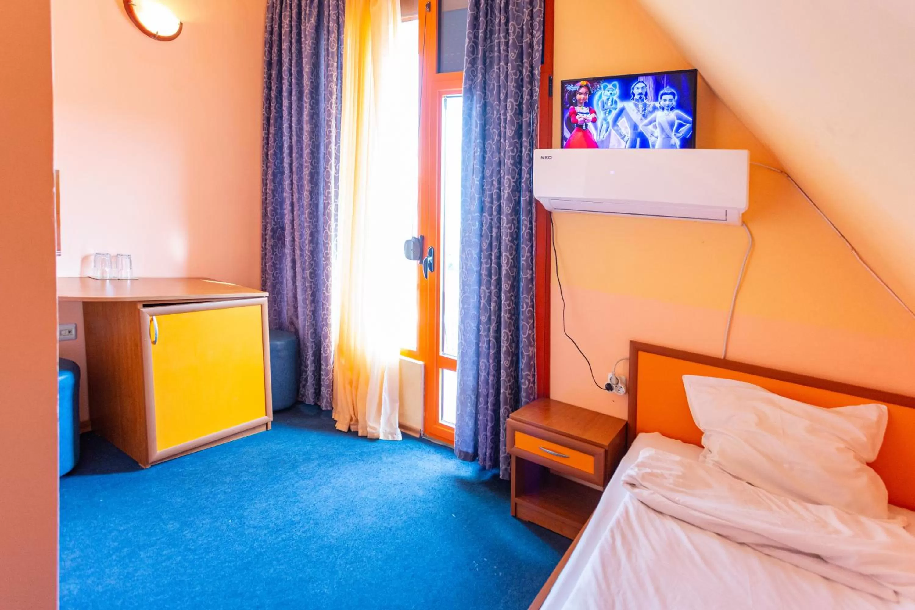 Bed in Family Hotel Jemelly