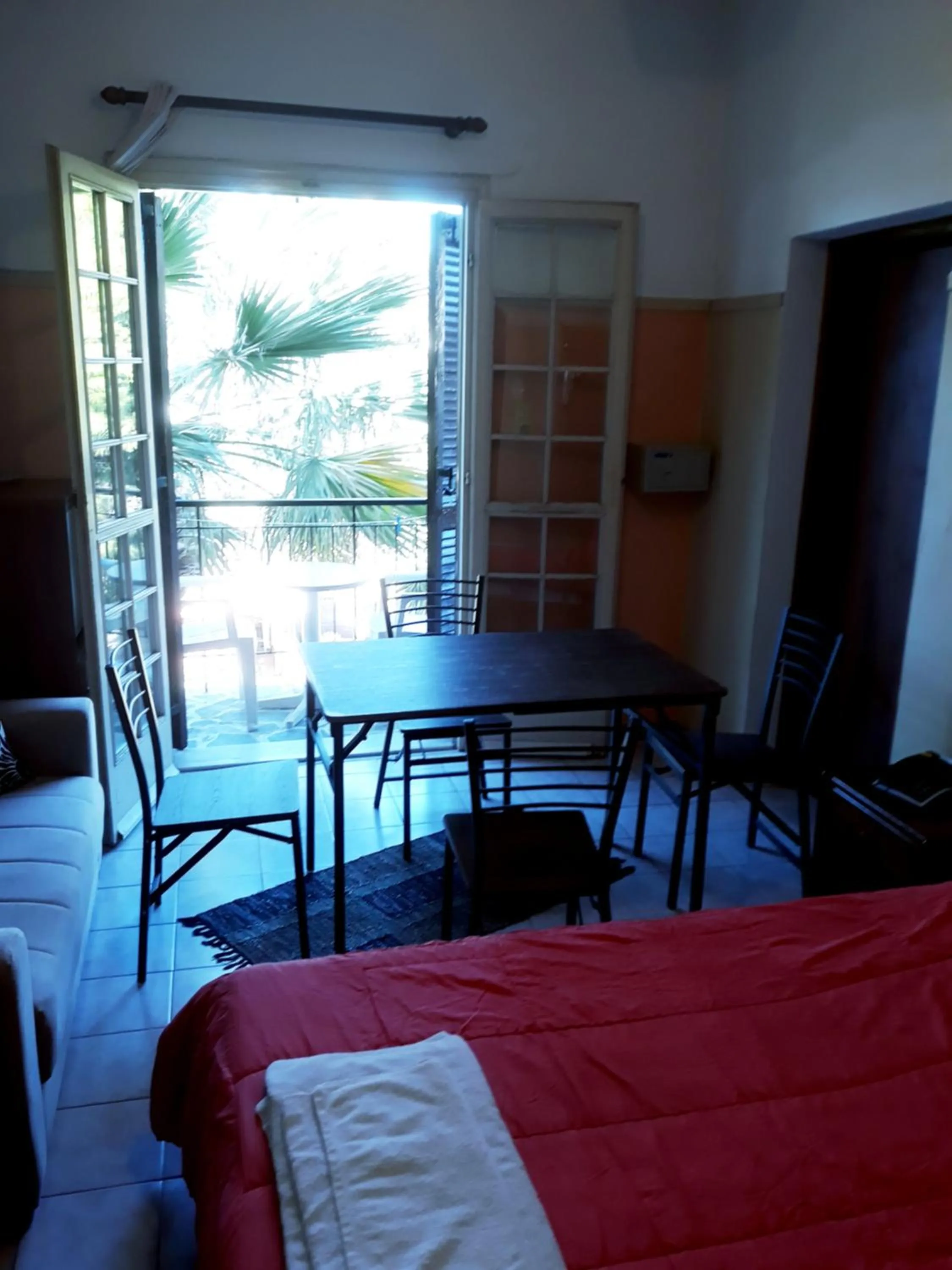 Seating area, Bed in Miranta Hotel - Apartments & Studios