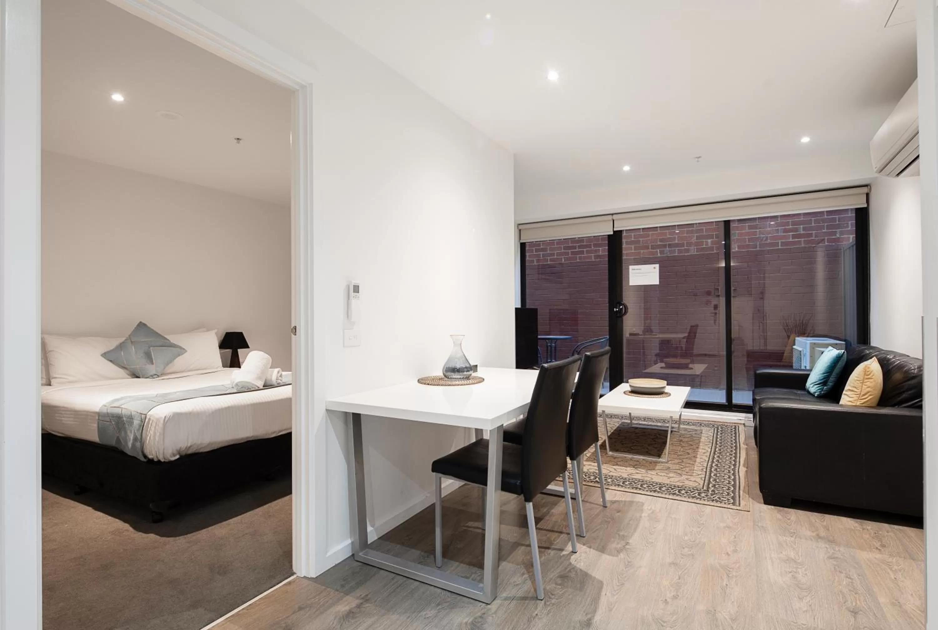 Living room, Bed in RNR Serviced Apartments North Melbourne
