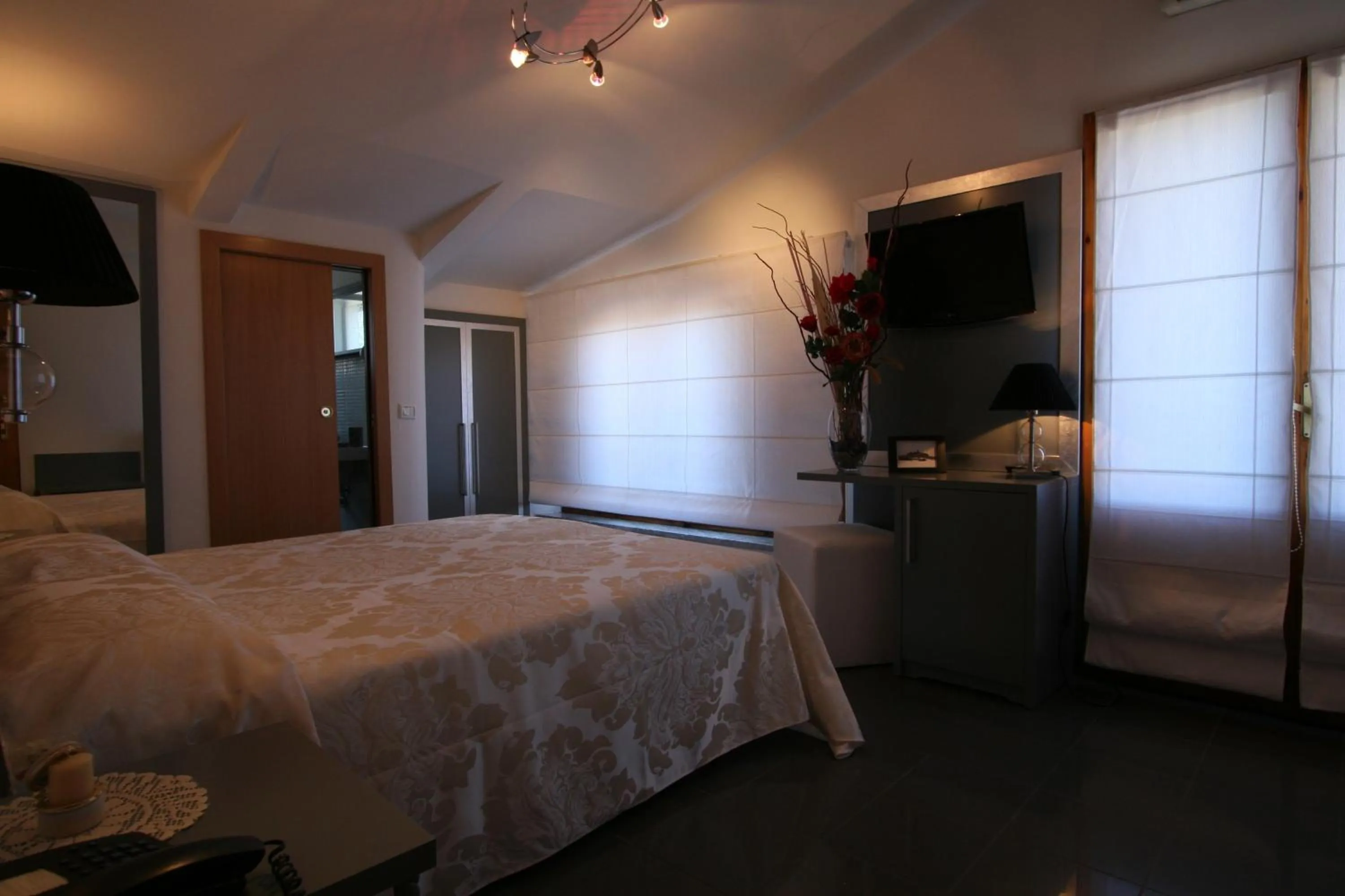 Bed in Hotel La Meridiana