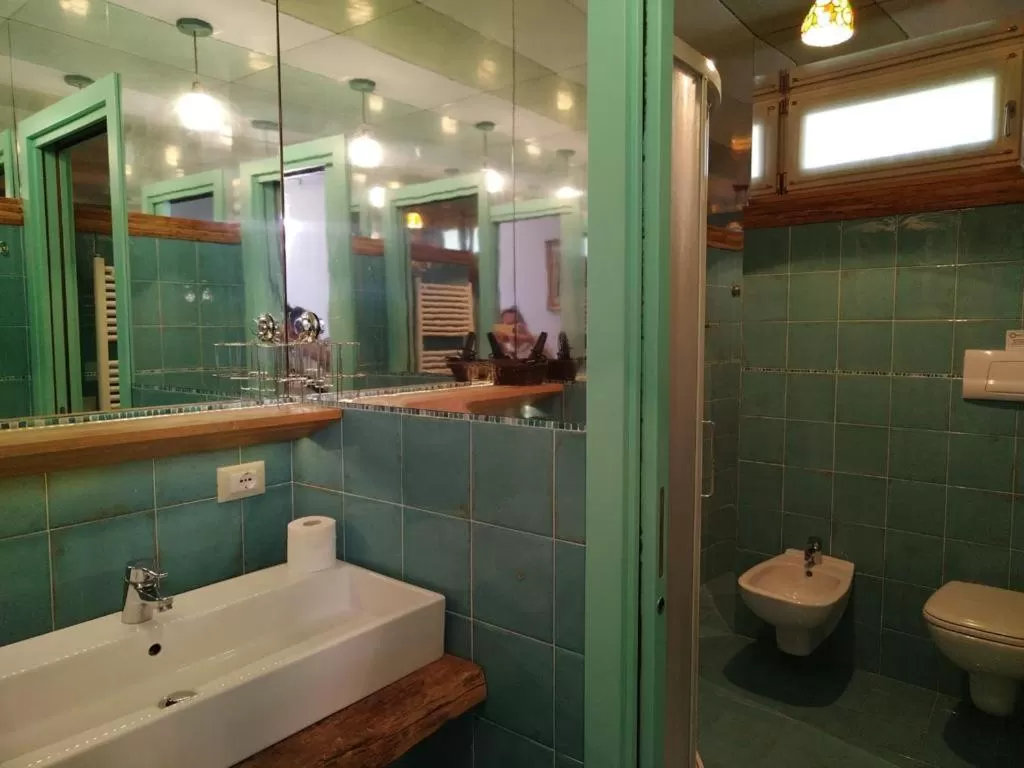 Bathroom in Borgo al Sole by Garda Facilities