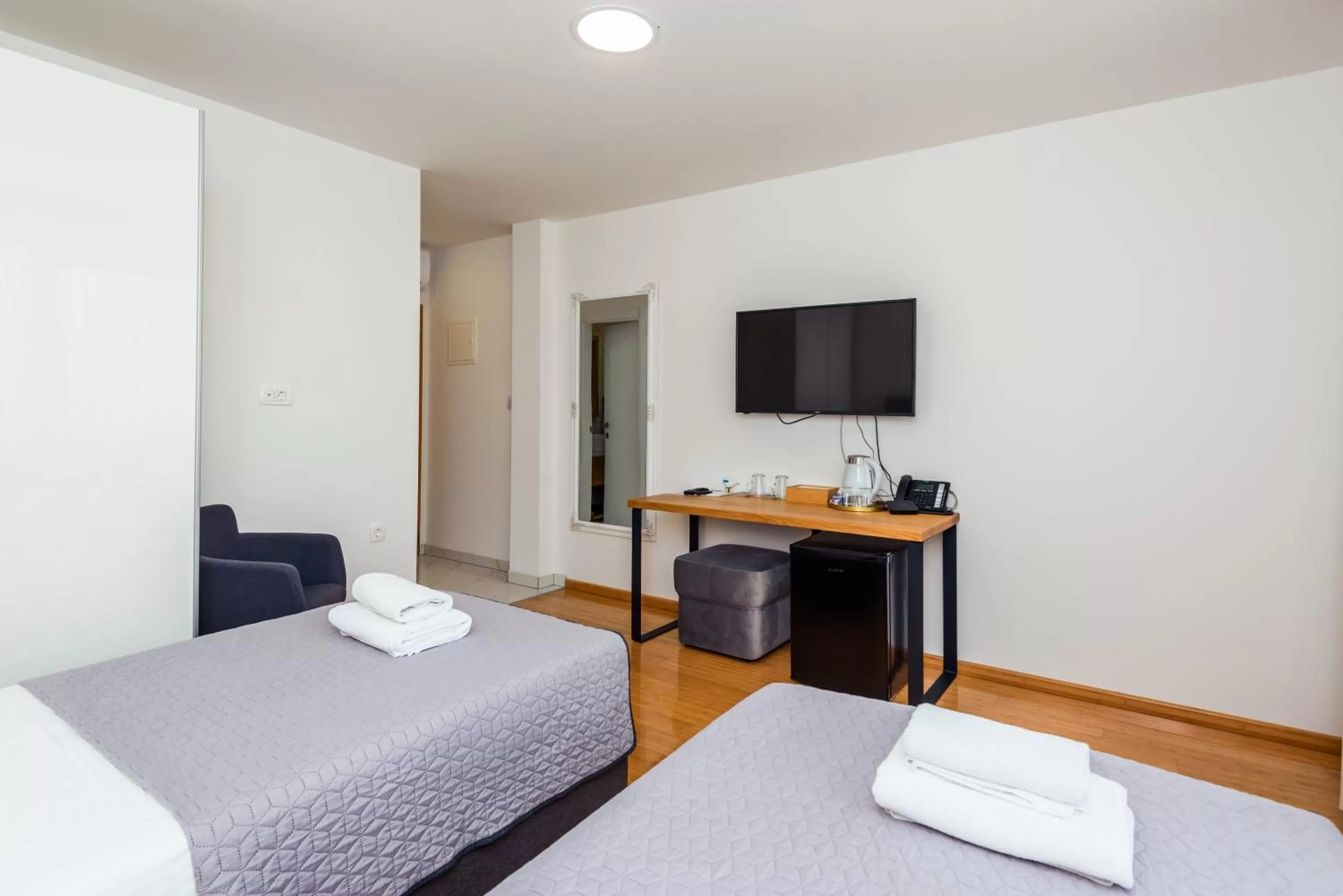 TV and multimedia, Bed in Boutique rooms Kican