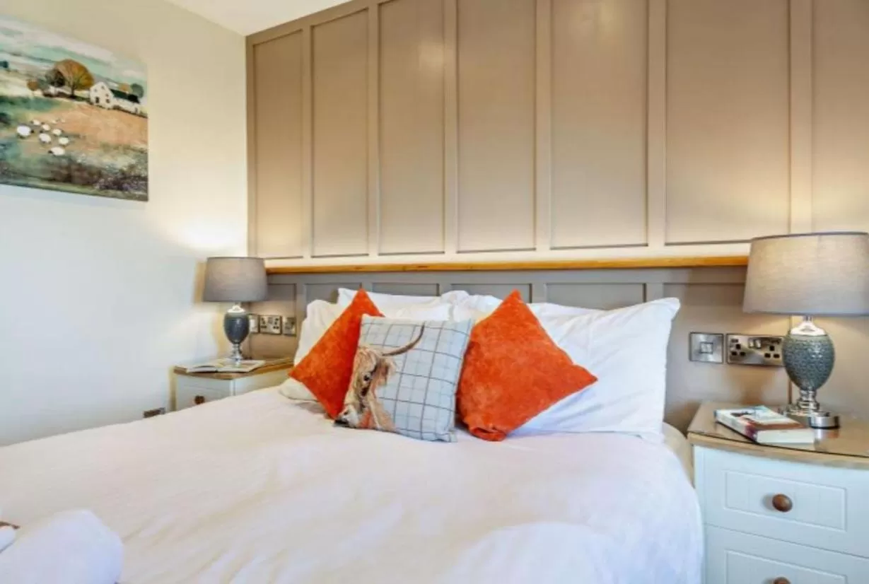 Bed in Lion Hotel & Studio Apartments