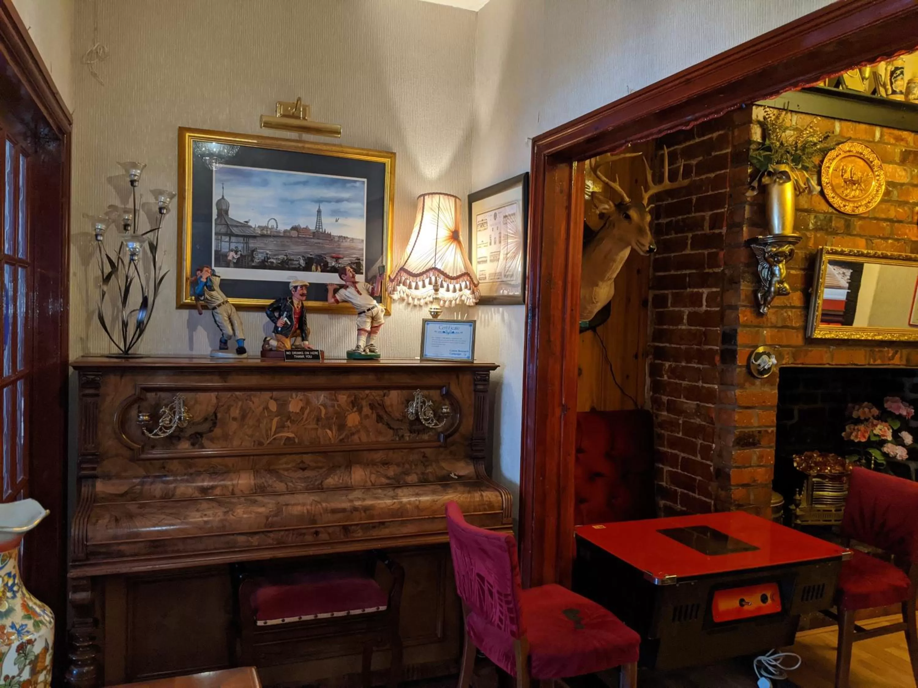 Communal lounge/ TV room in The New Guilderoy Hotel