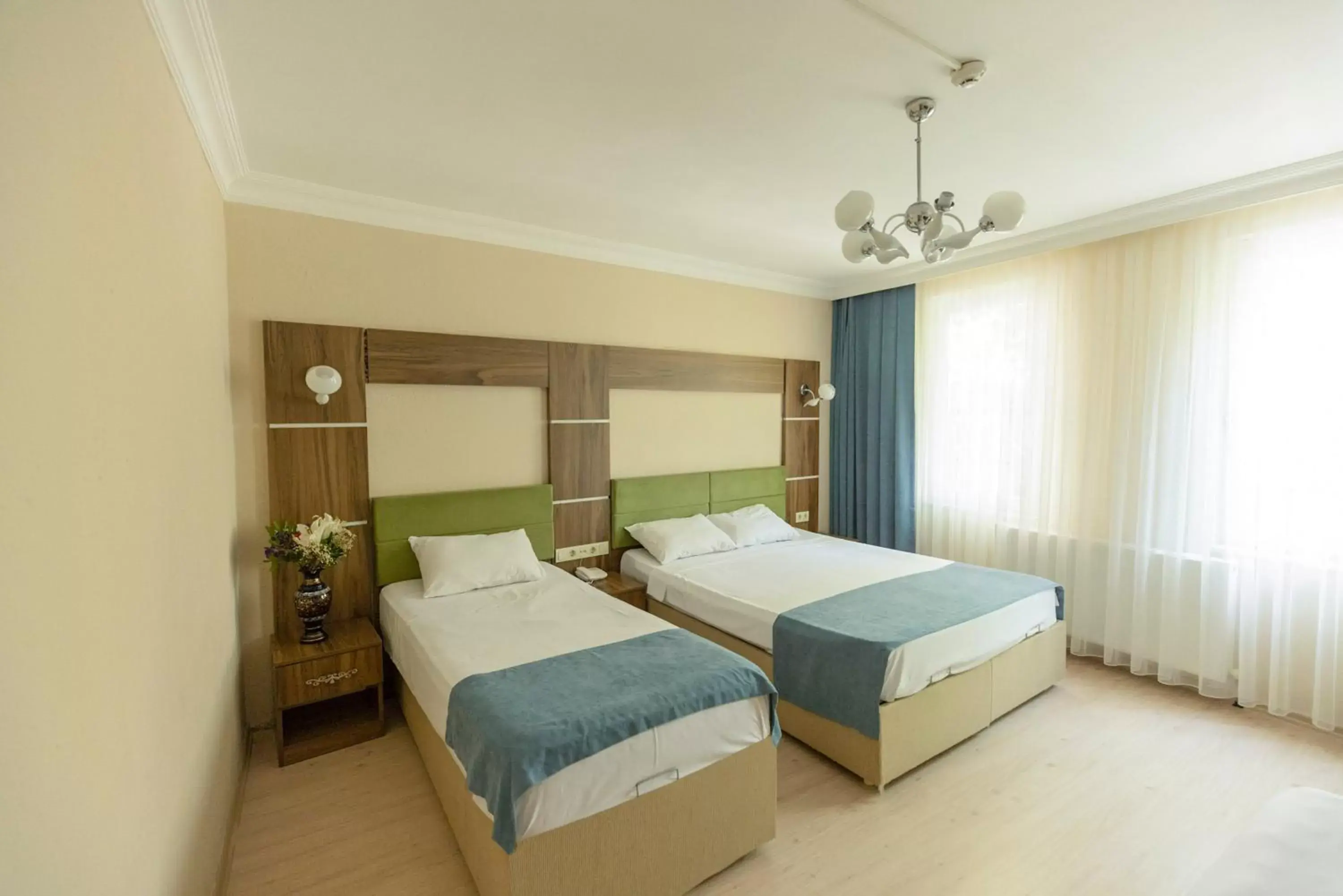 Classic Triple Room in De Marêe Classic Triple Room in De Marêe