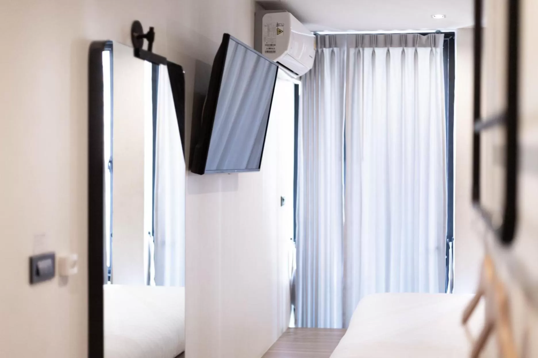 TV and multimedia, TV/Entertainment Center in The Singha Hotel - Korat