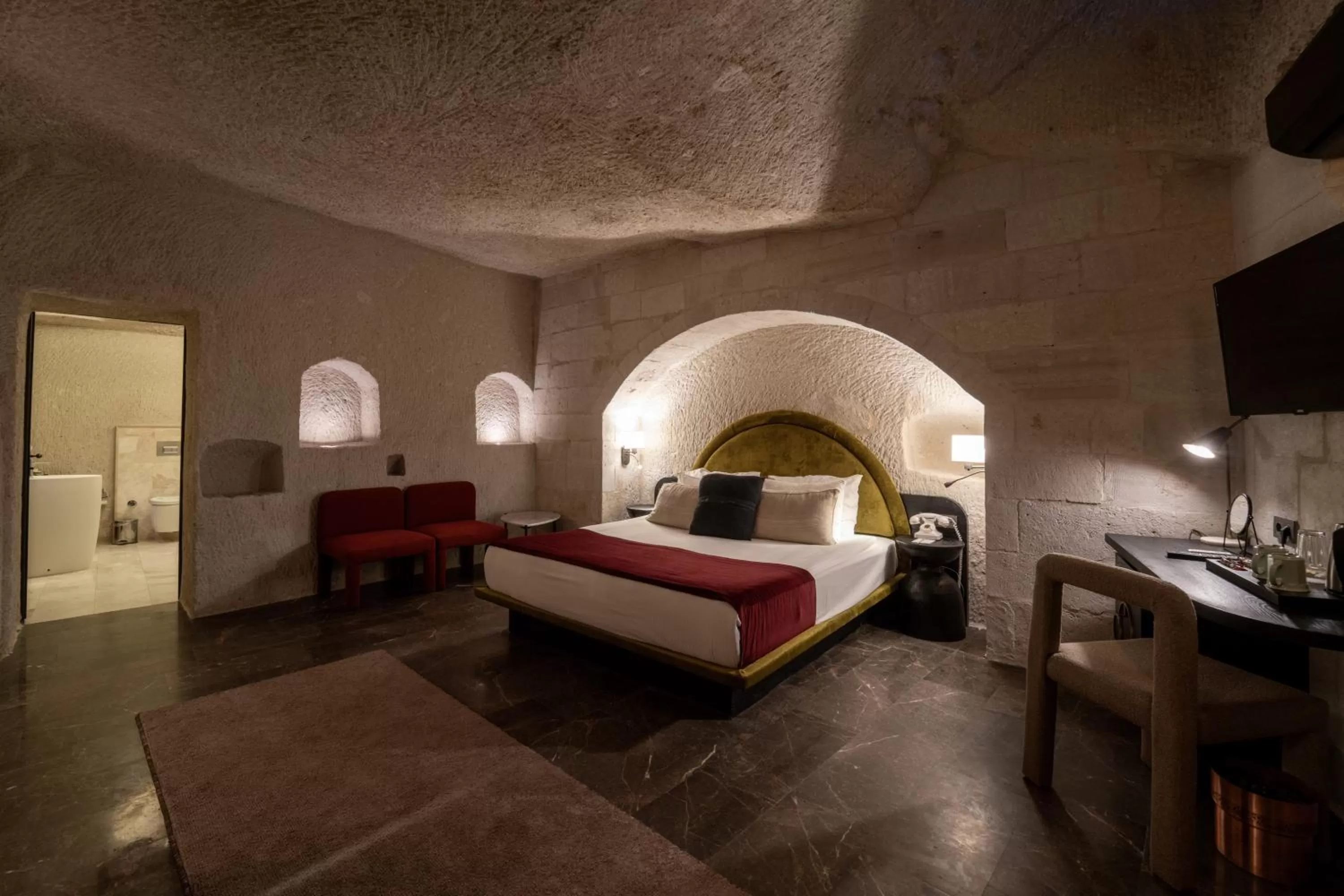 Bedroom, Bed in Artemis Cave Suites & Spa- Adults Only