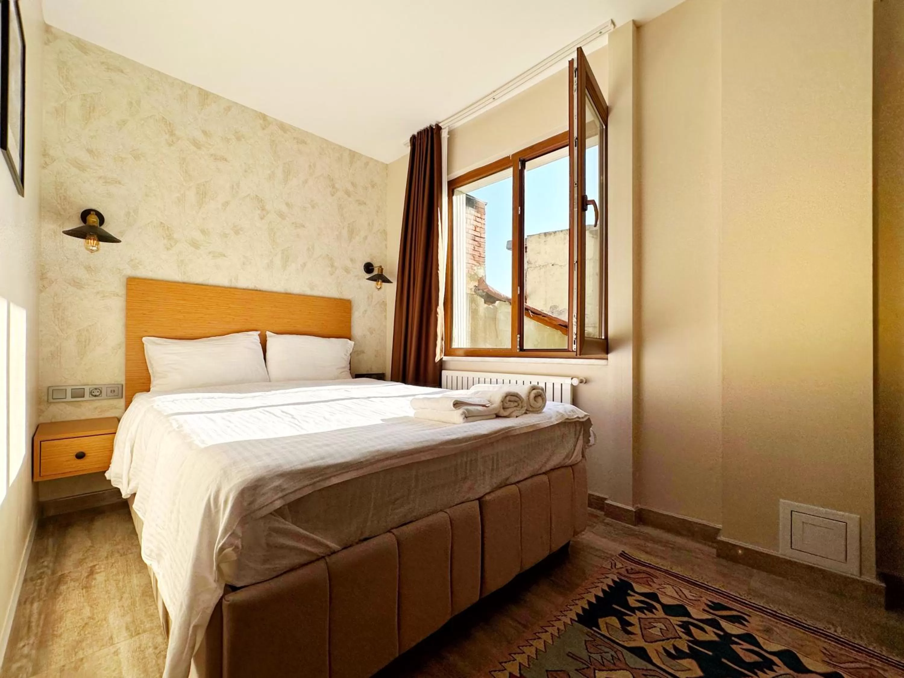 Bed in Sultan Pier Hotel