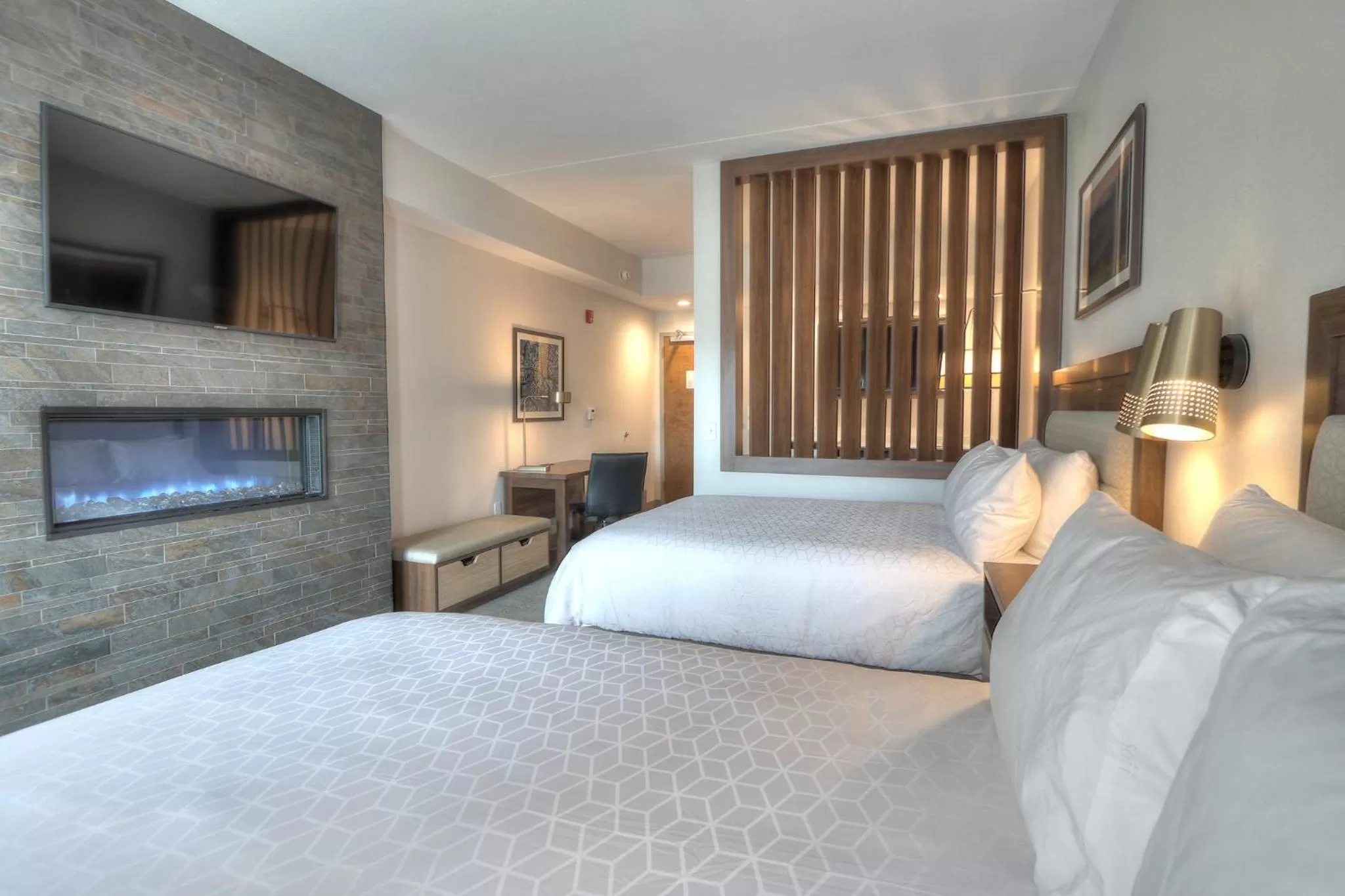 Photo of the whole room, Bed in Holiday Inn & Suites Pigeon Forge Convention Center by IHG