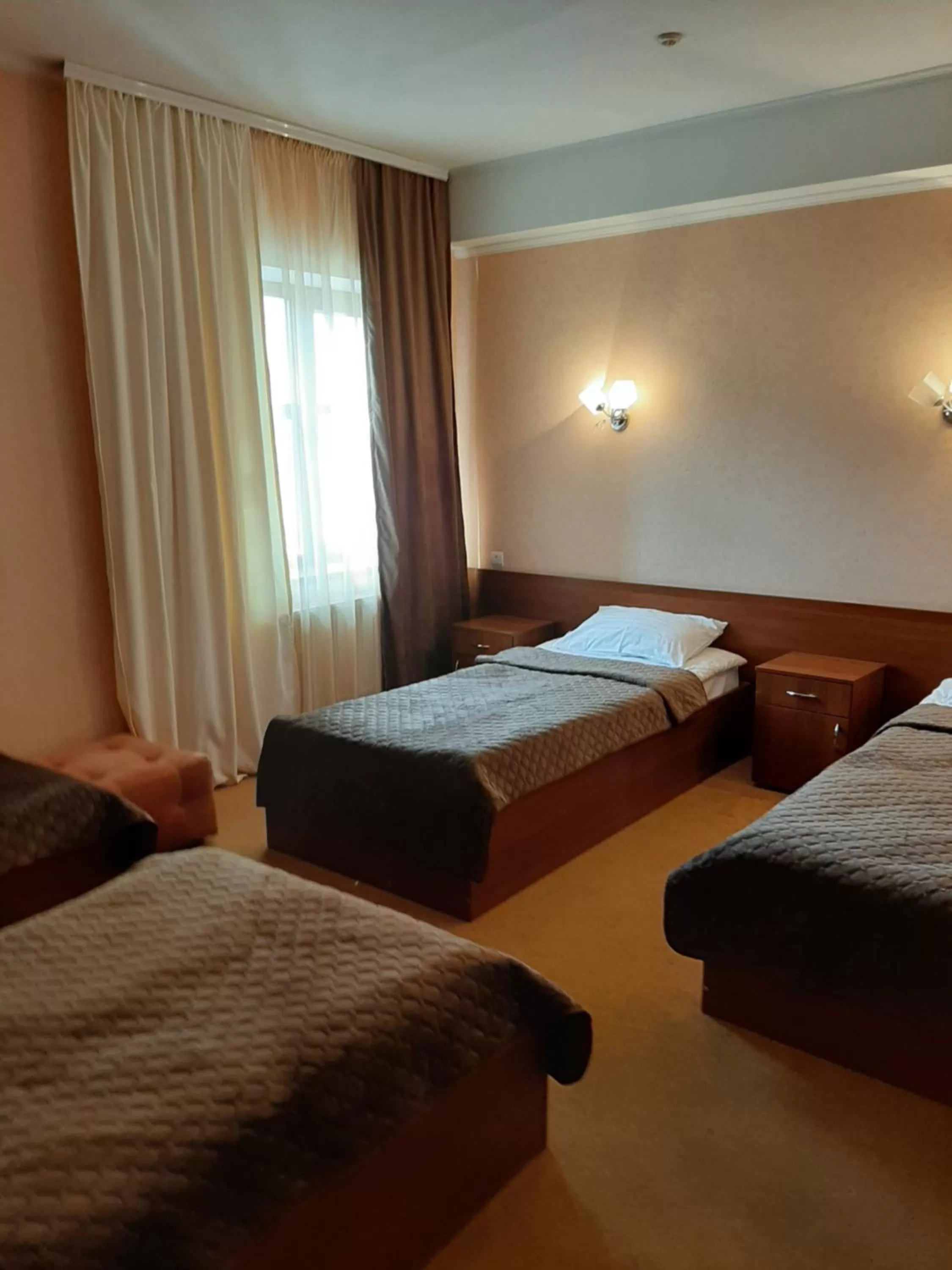 Bed in Stara Vezha Hotel