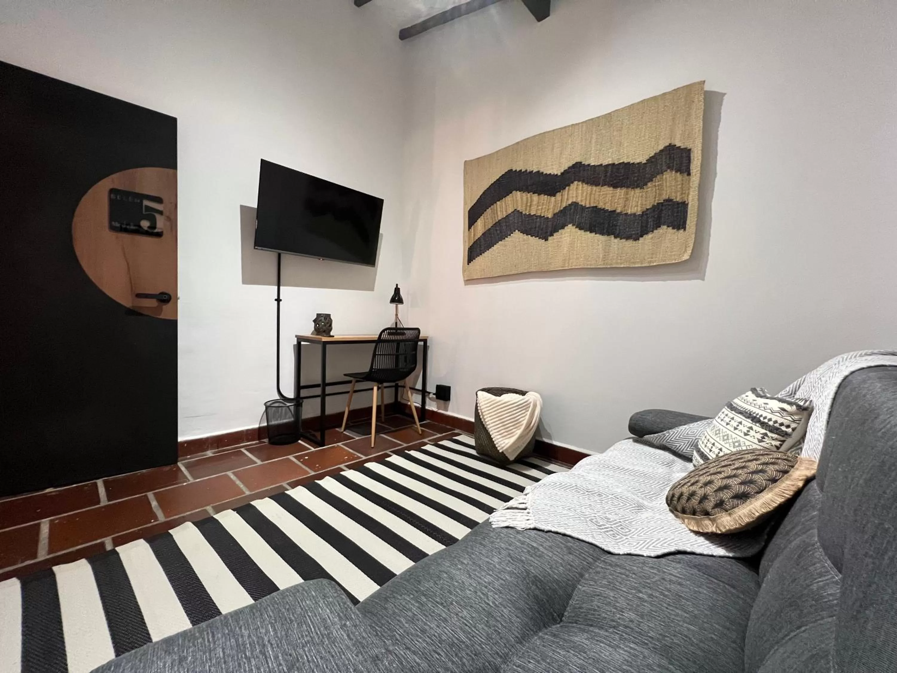 Seating area, Bed in Casa Medallo